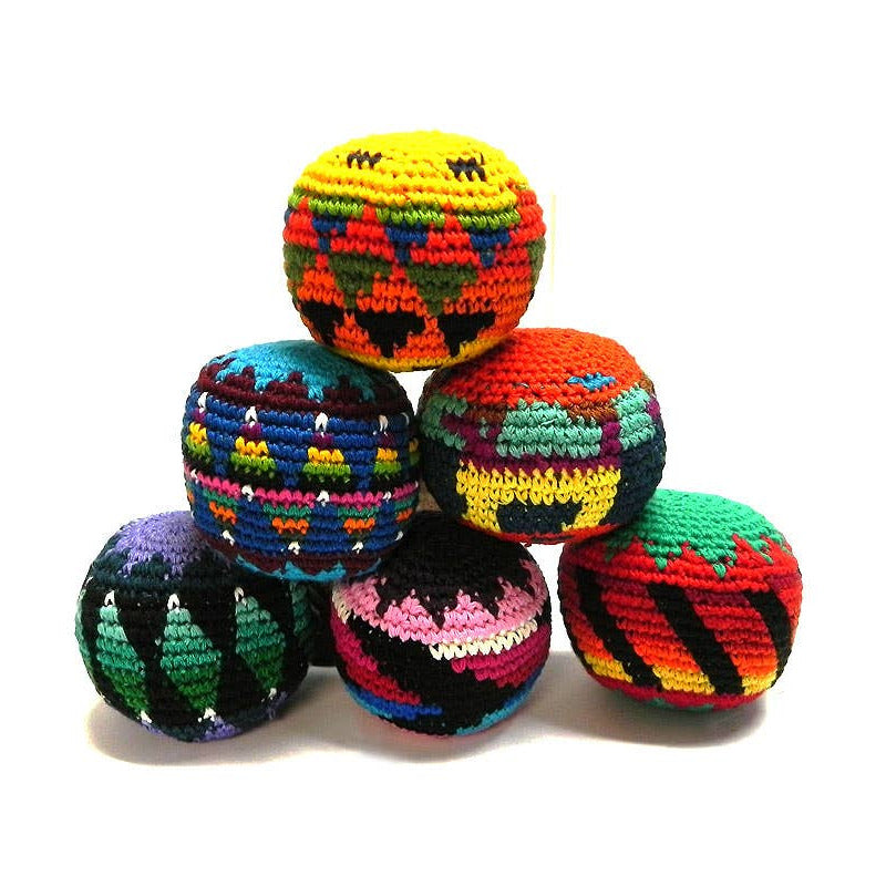 Colorful crocheted balls on a white background