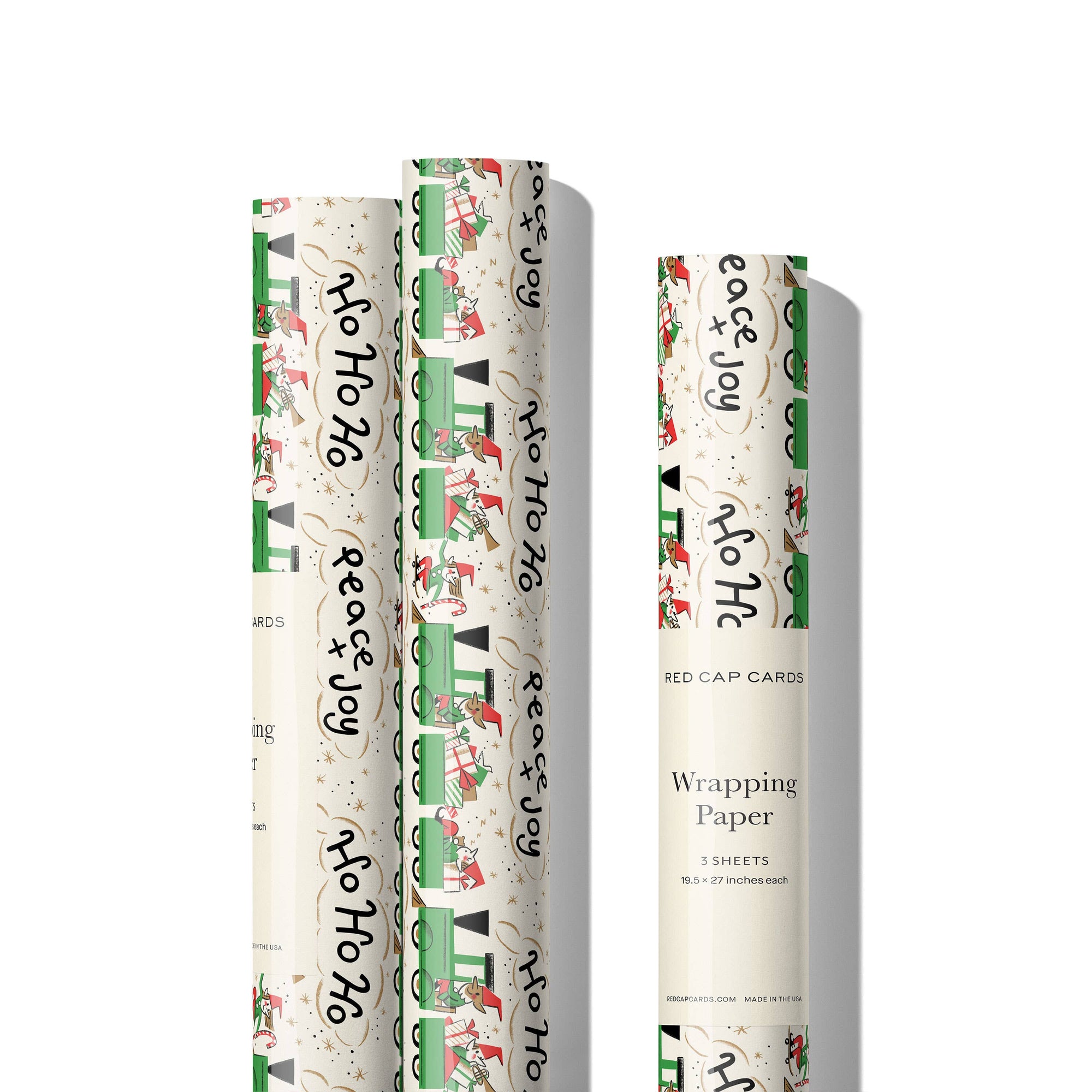 Three rolls of Christmas-themed wrapping paper with festive designs on a white background.
