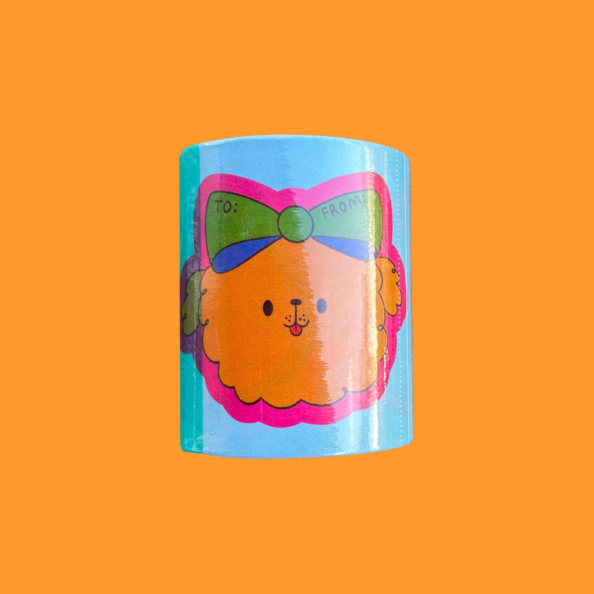 Cylindrical product with a cartoon lion design on a bright orange background