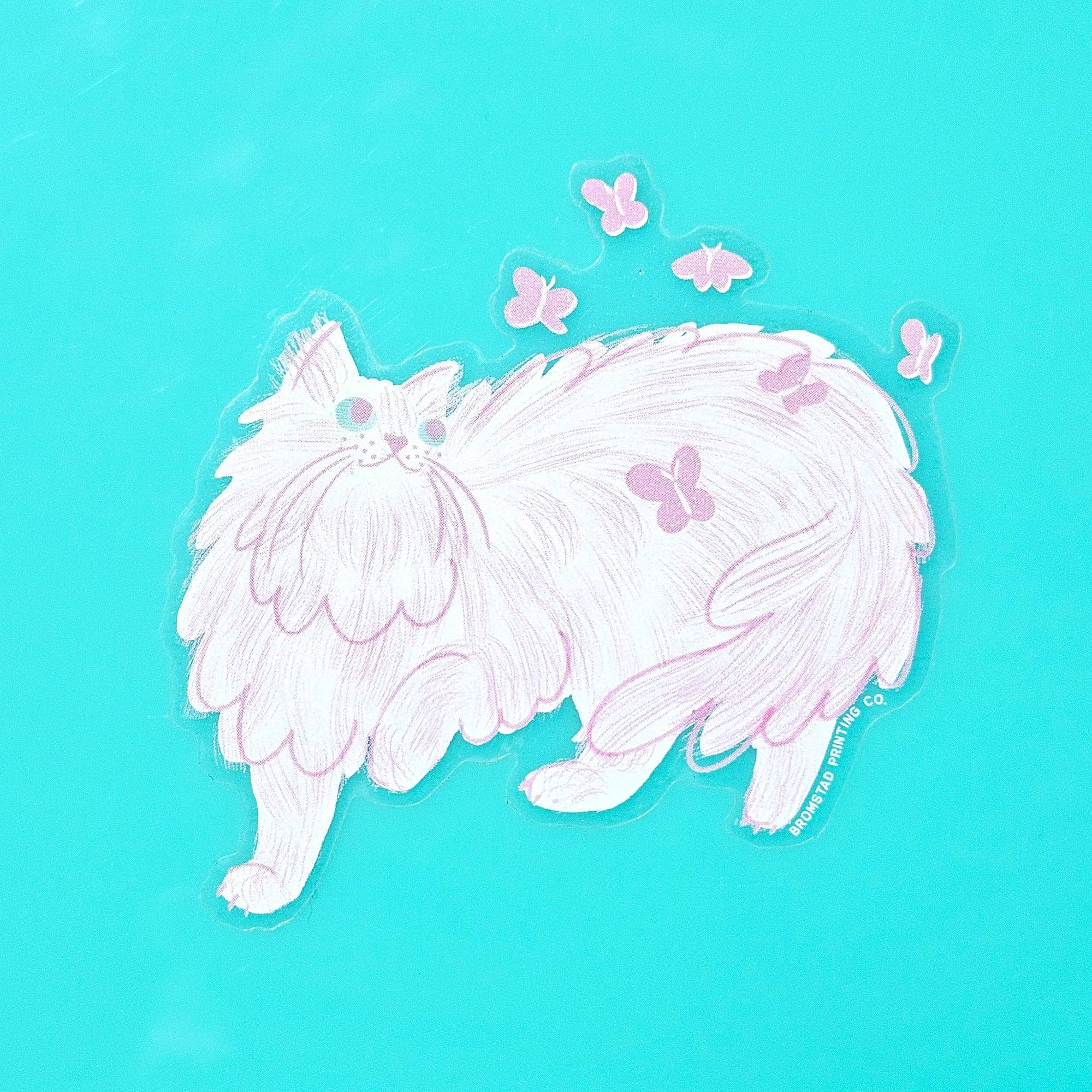 White cat sticker with butterflies on a turquoise background