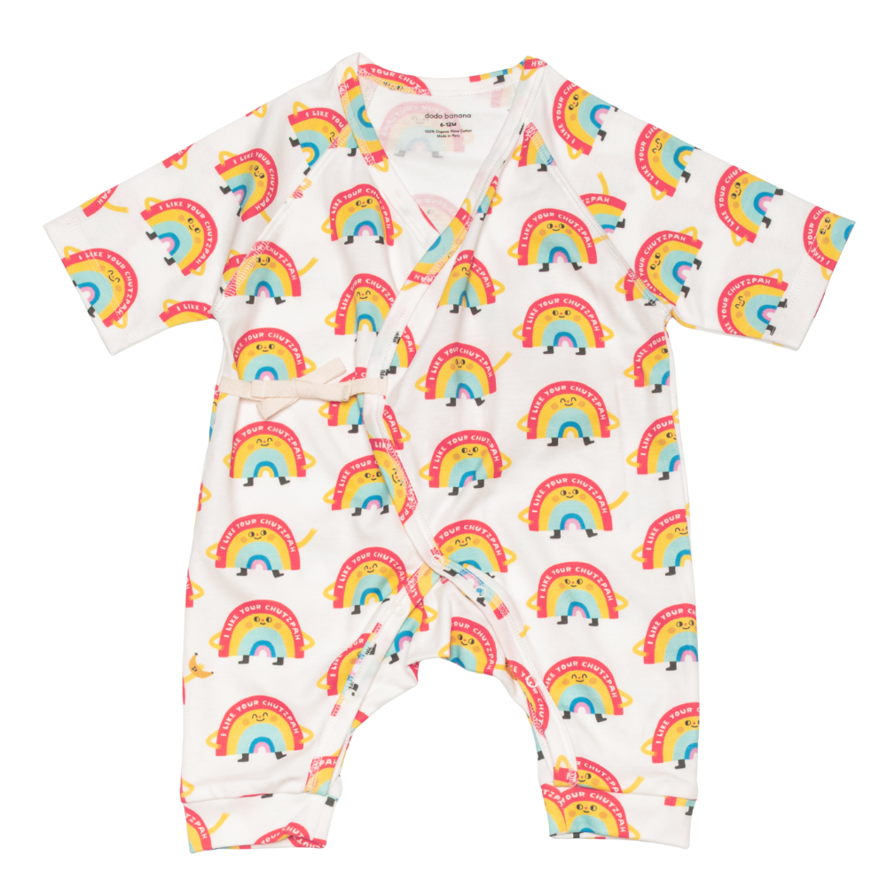 Baby romper with rainbow pattern on a white background