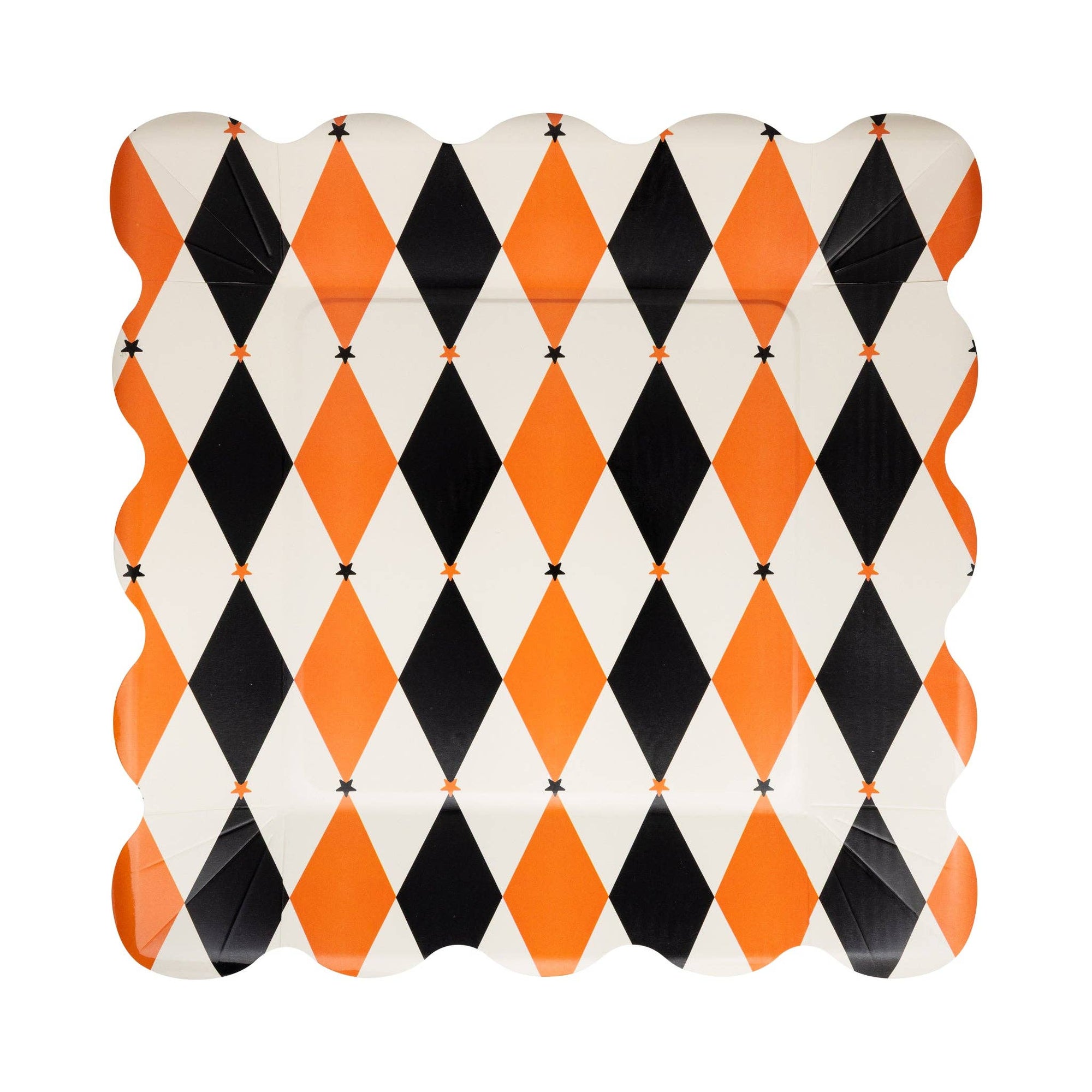 Harlequin patterned paper plate with orange, black, and white design on a white background