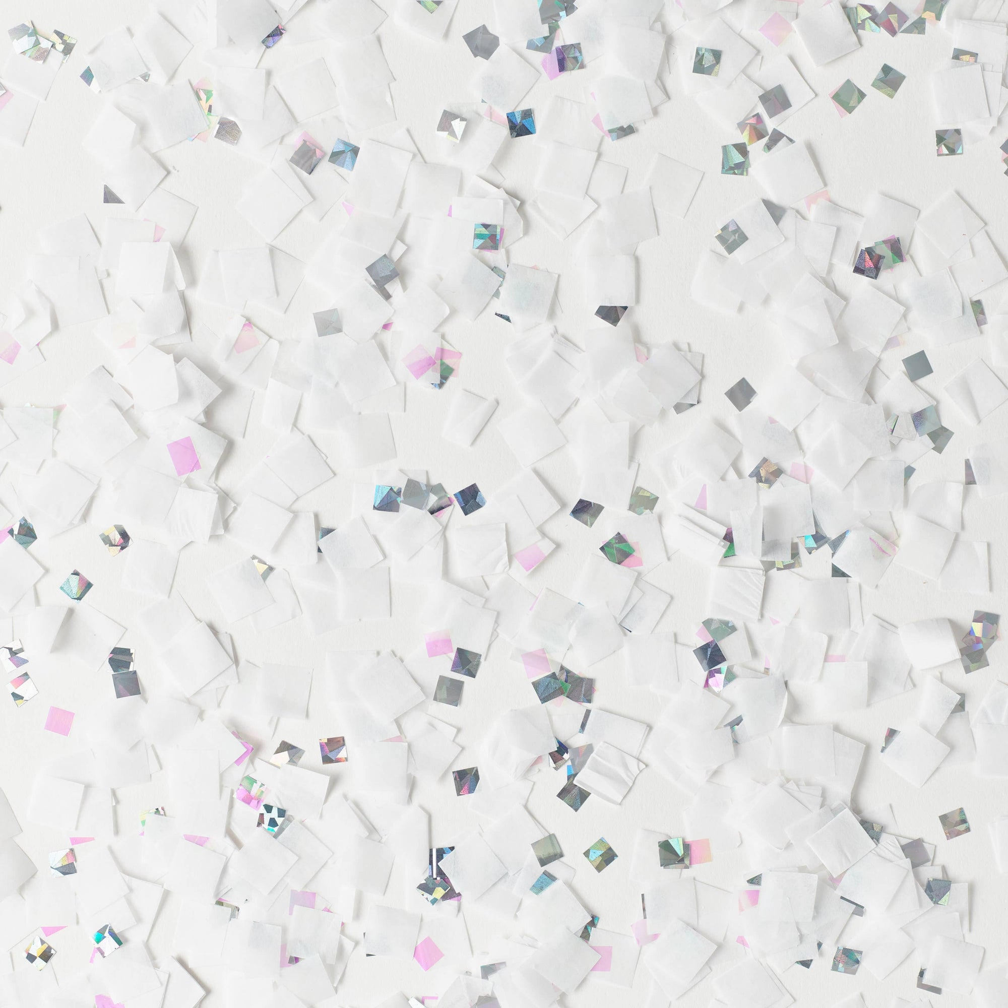 Pattern of small colorful squares on a white background