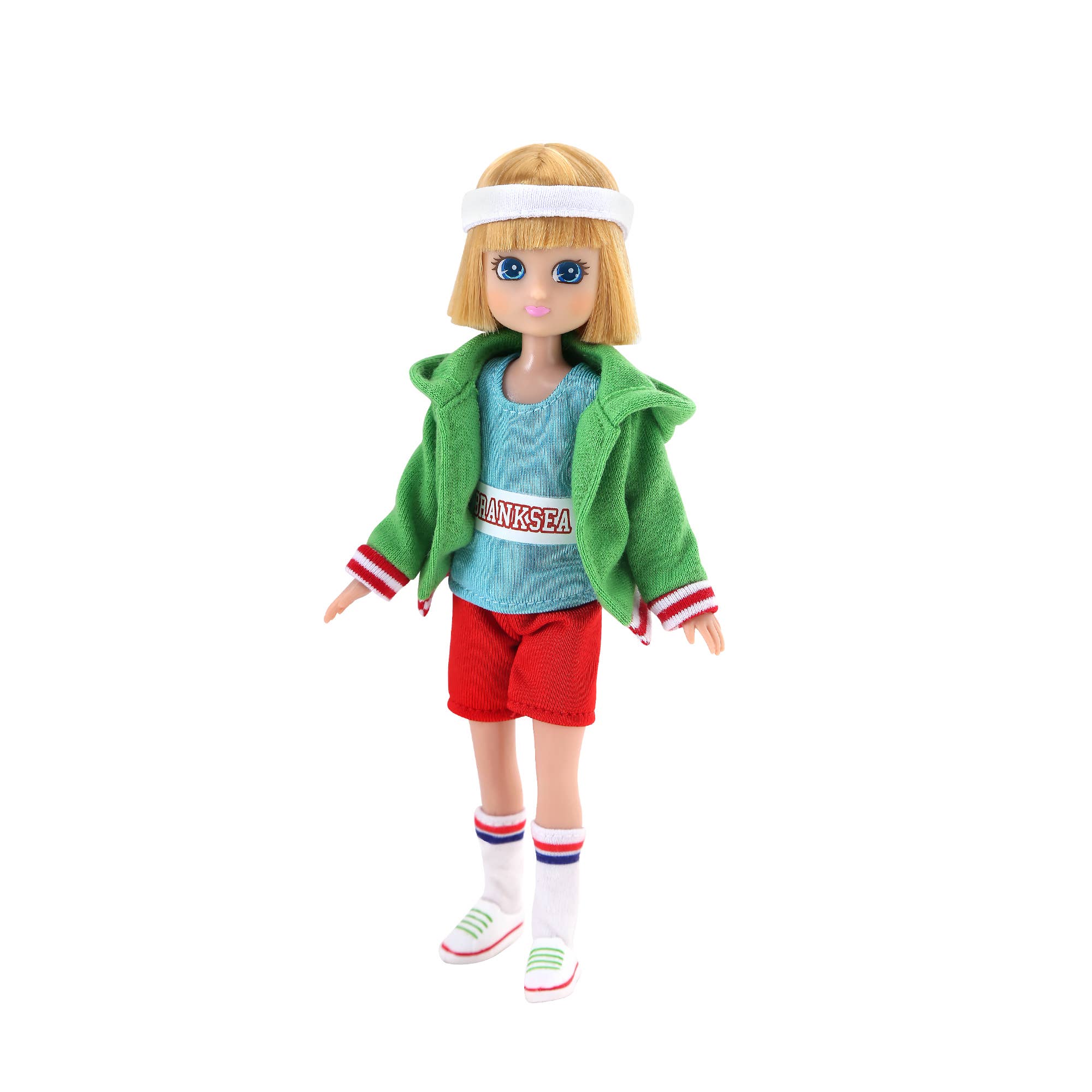 Toy doll wearing a green jacket, blue shirt, red shorts, and white shoes on a white background