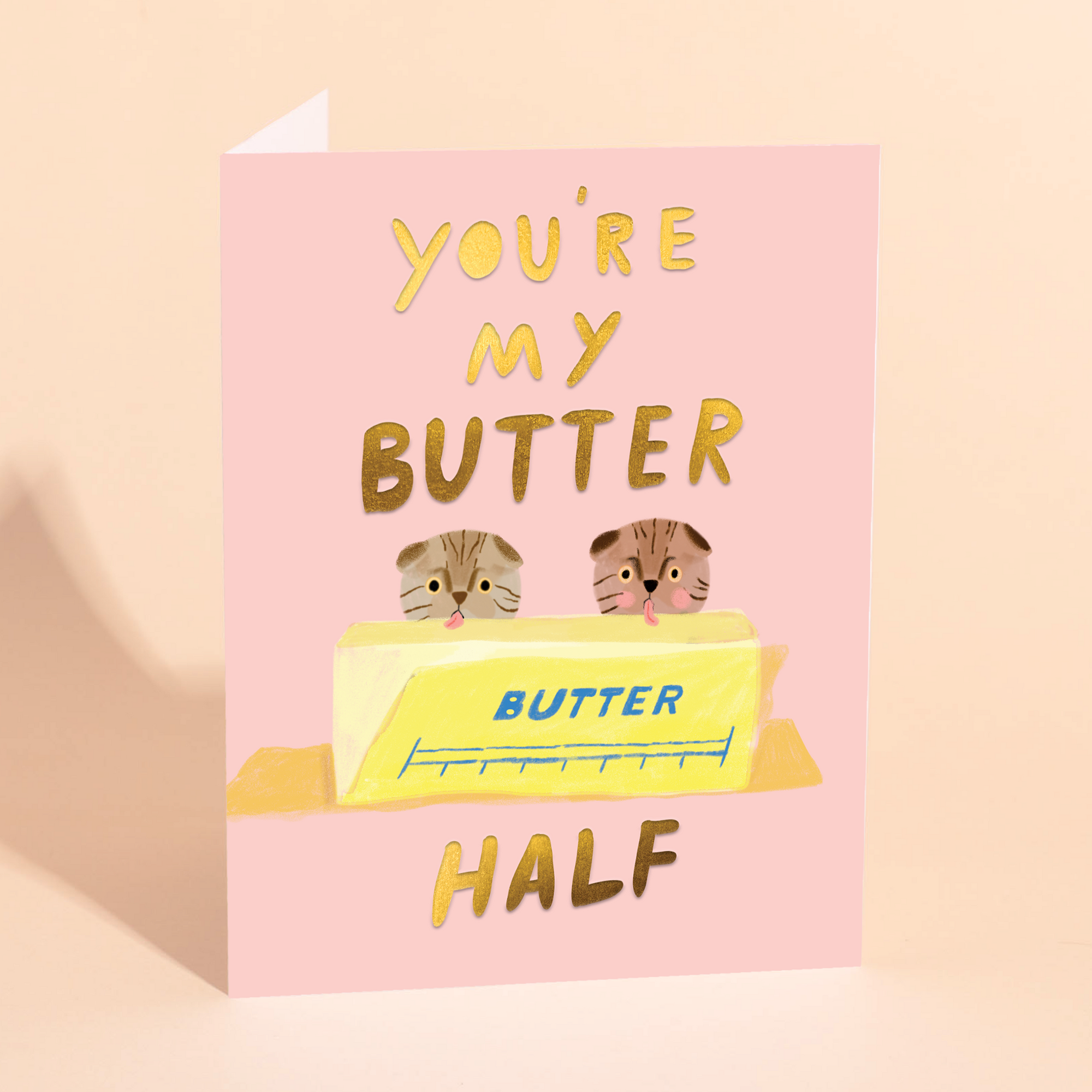 Greeting card with a butter illustration and text on a pink background