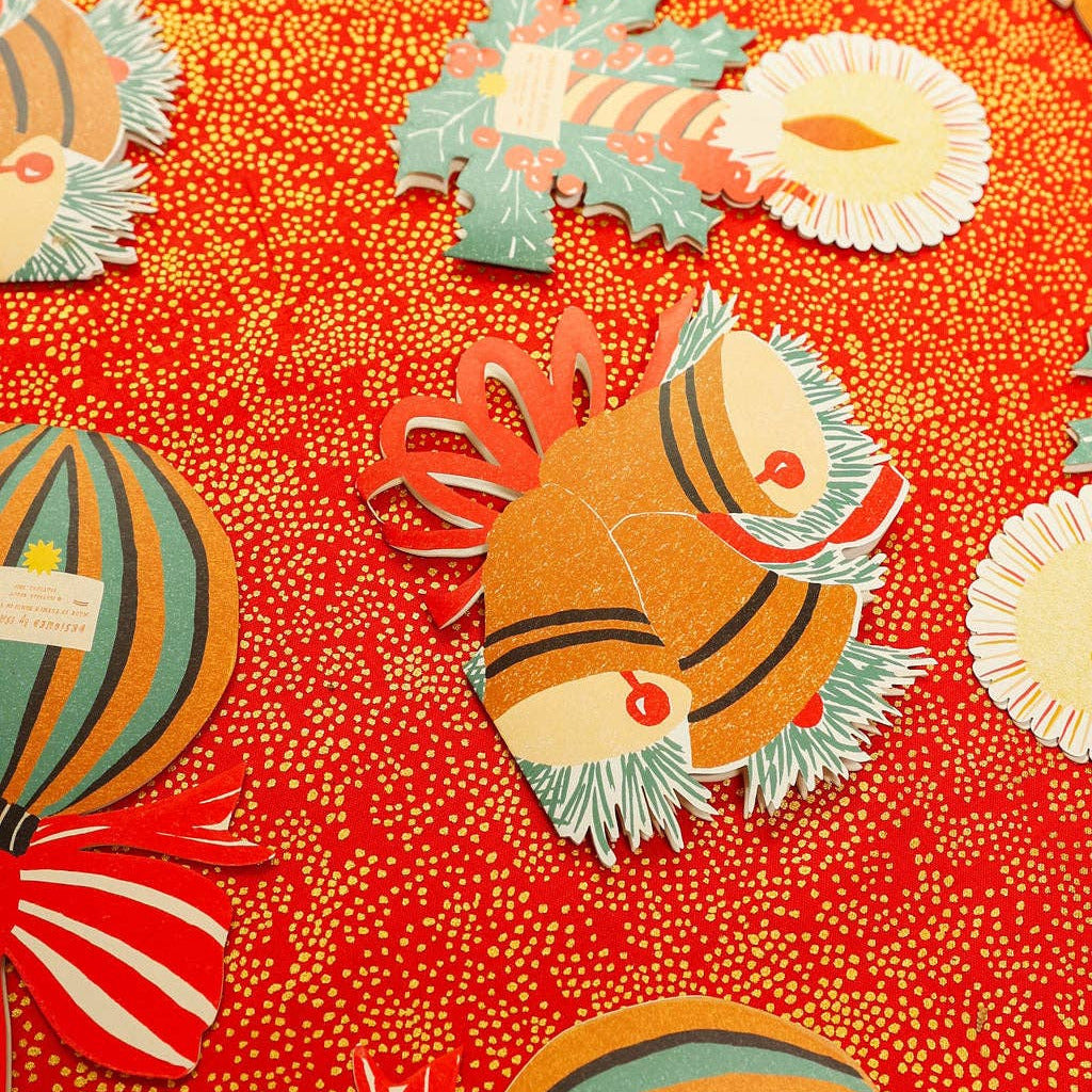 Vintage-style pattern with colorful fish and shells on a red background