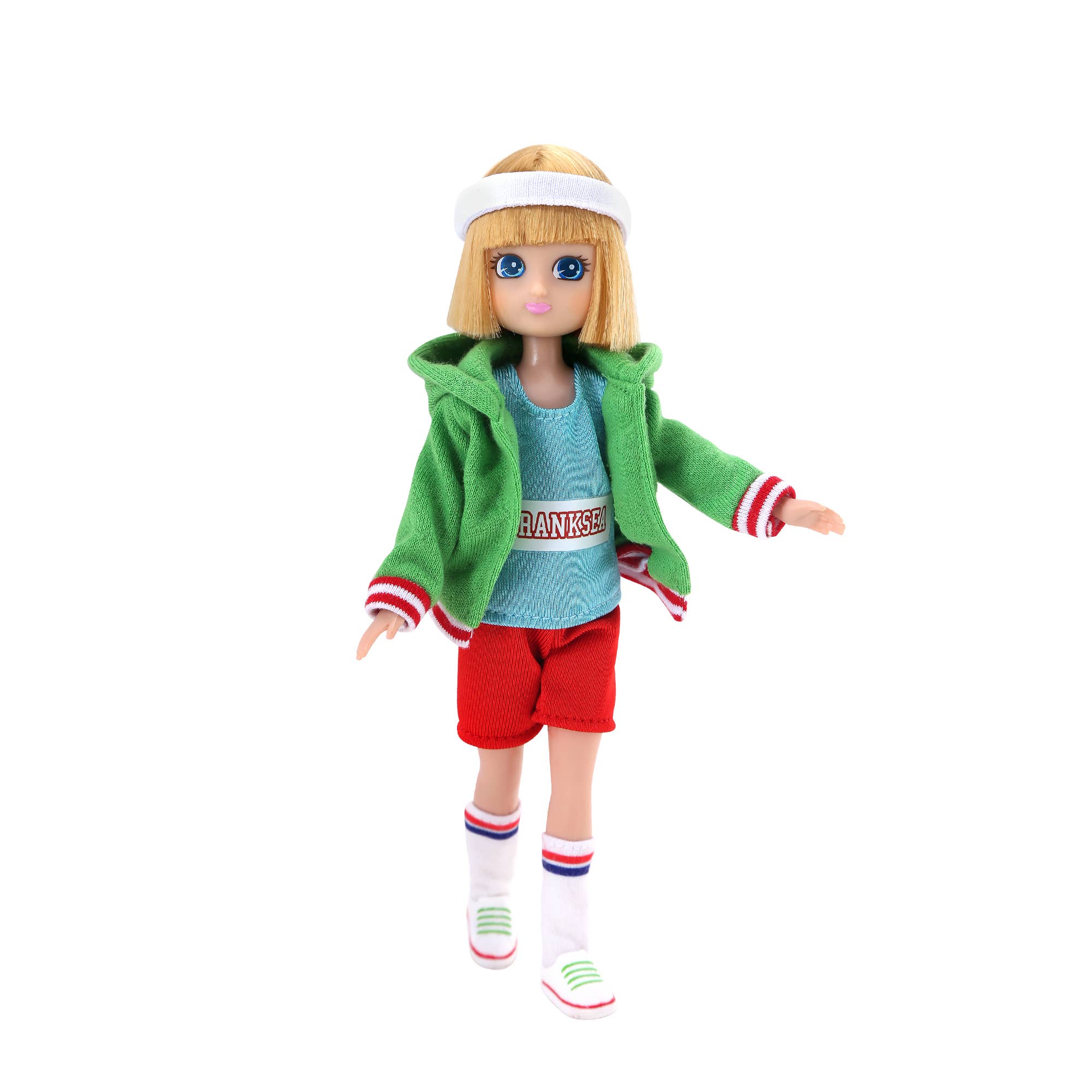 Doll wearing a green jacket, blue shirt, red shorts, and white socks on a white background