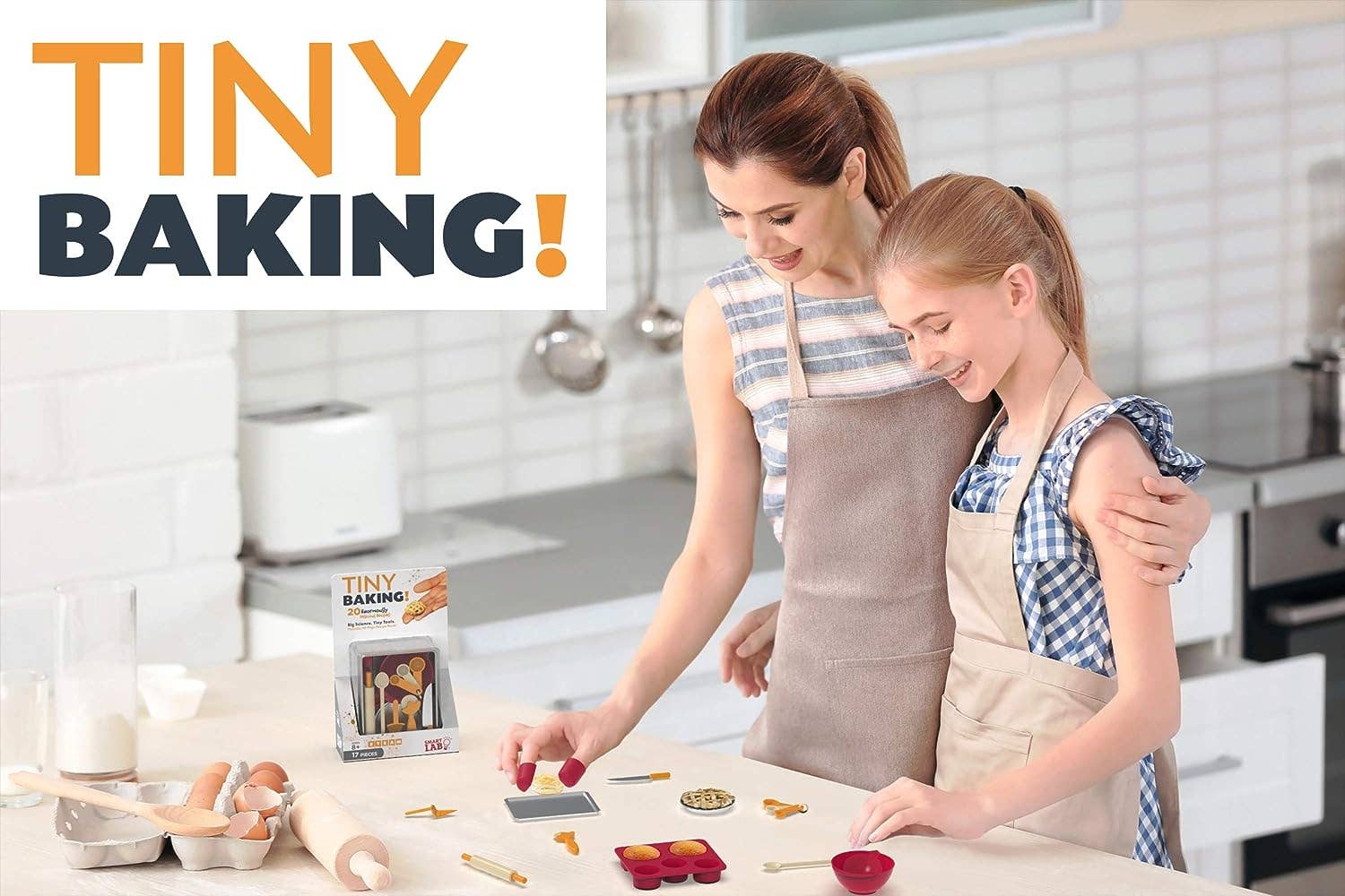 Woman and child in a kitchen with 'Tiny Baking!' product
