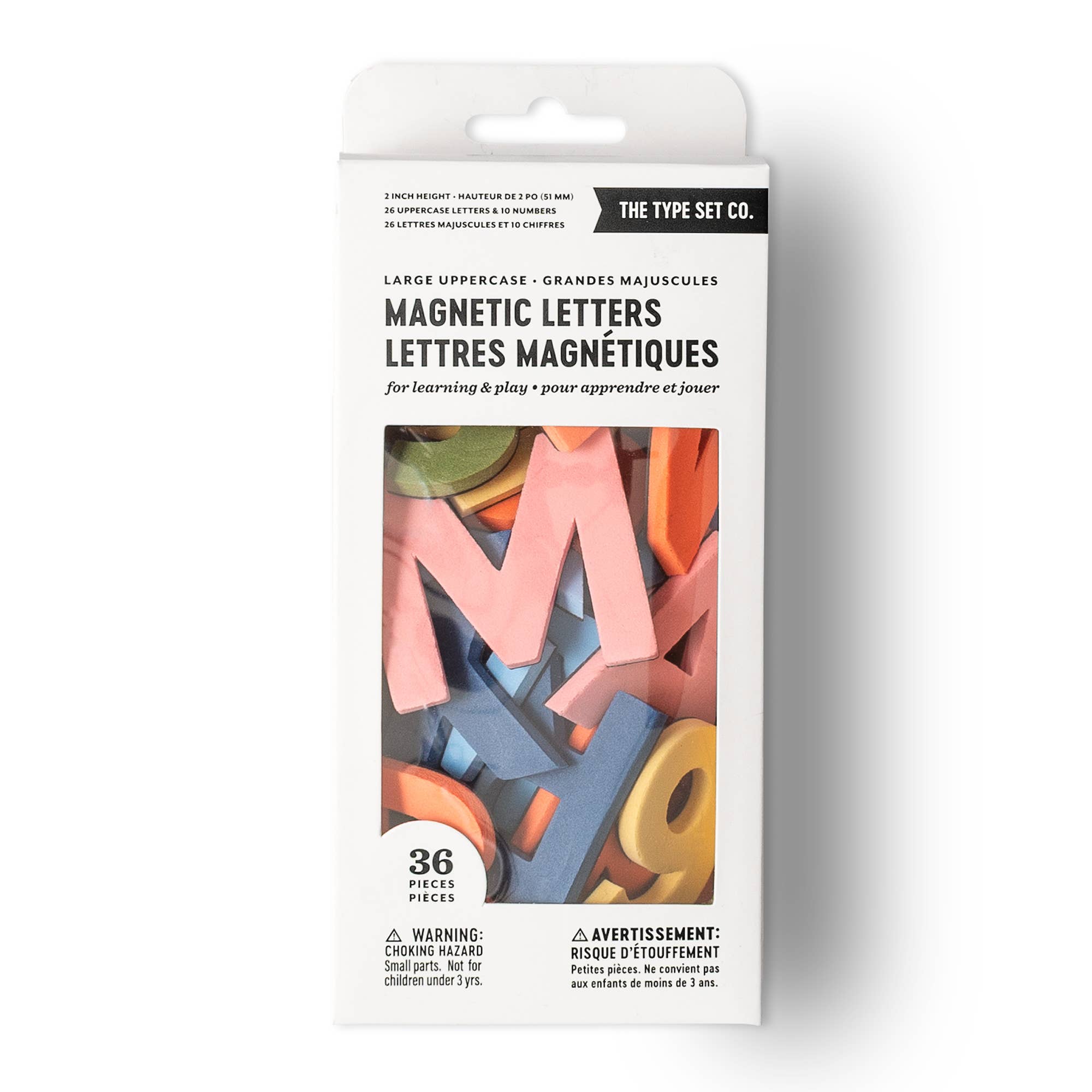 Packaging of magnetic letters with colorful letters on a white background