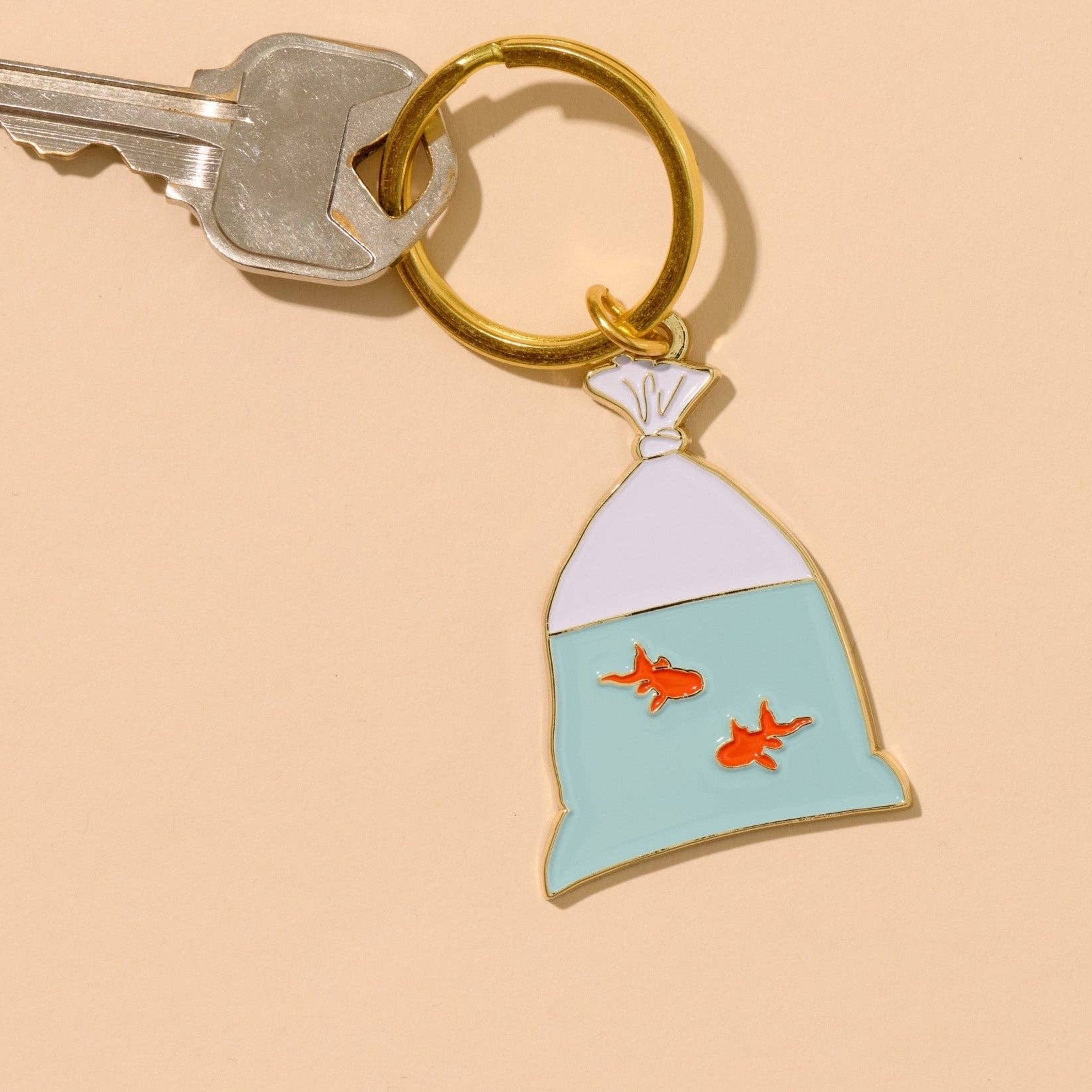 Goldfish in a Bag Enamel Keychain