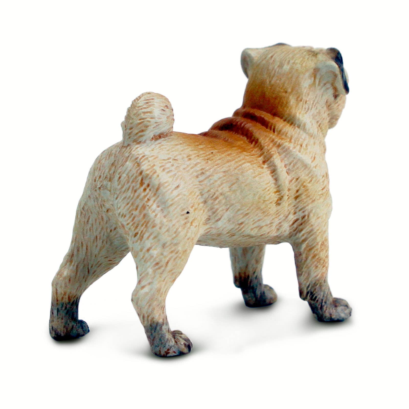 Dog figurine on a white background