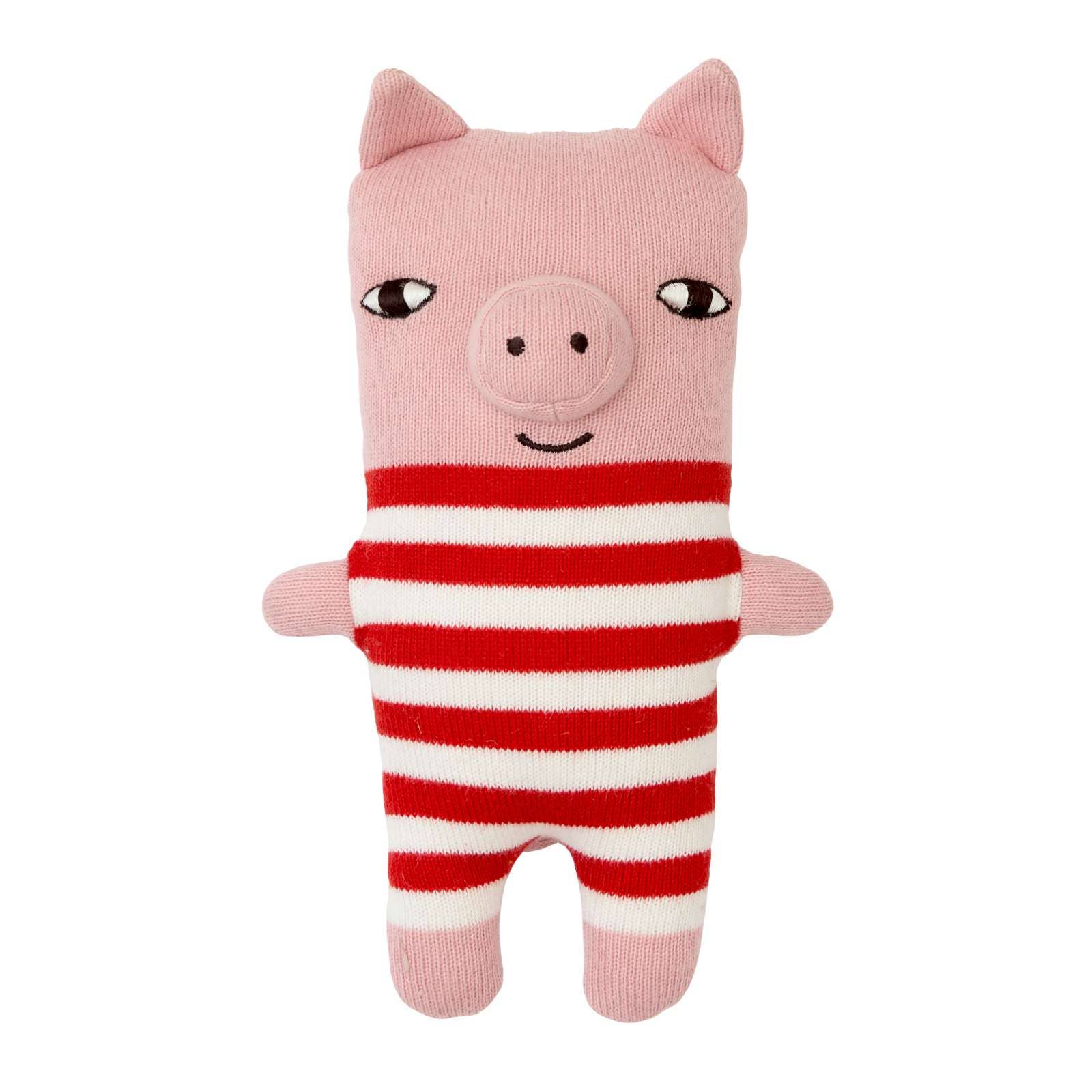 Pink plush toy pig with a red and white striped sweater on a white background