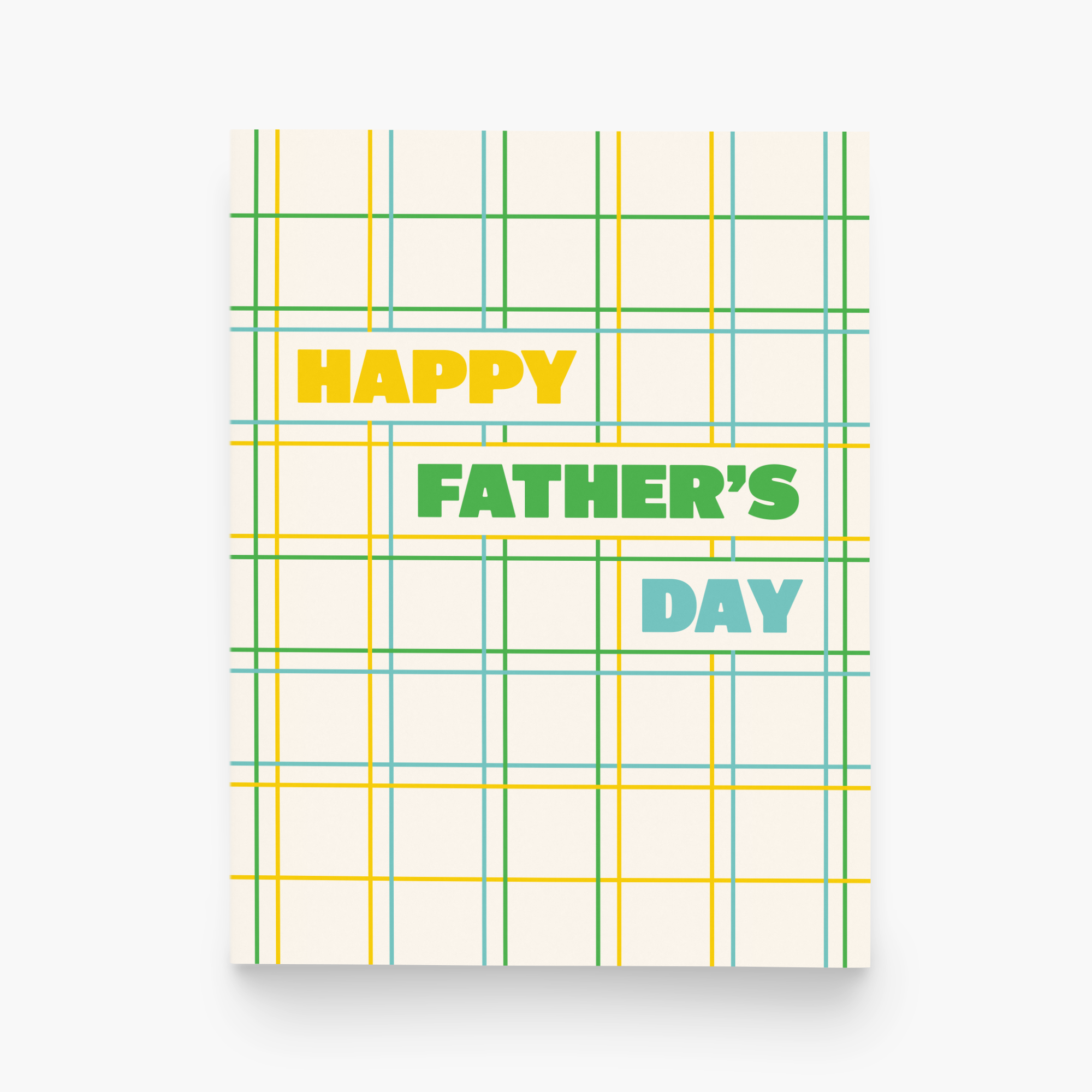 Card with 'Happy Father's Day' text on a plaid pattern