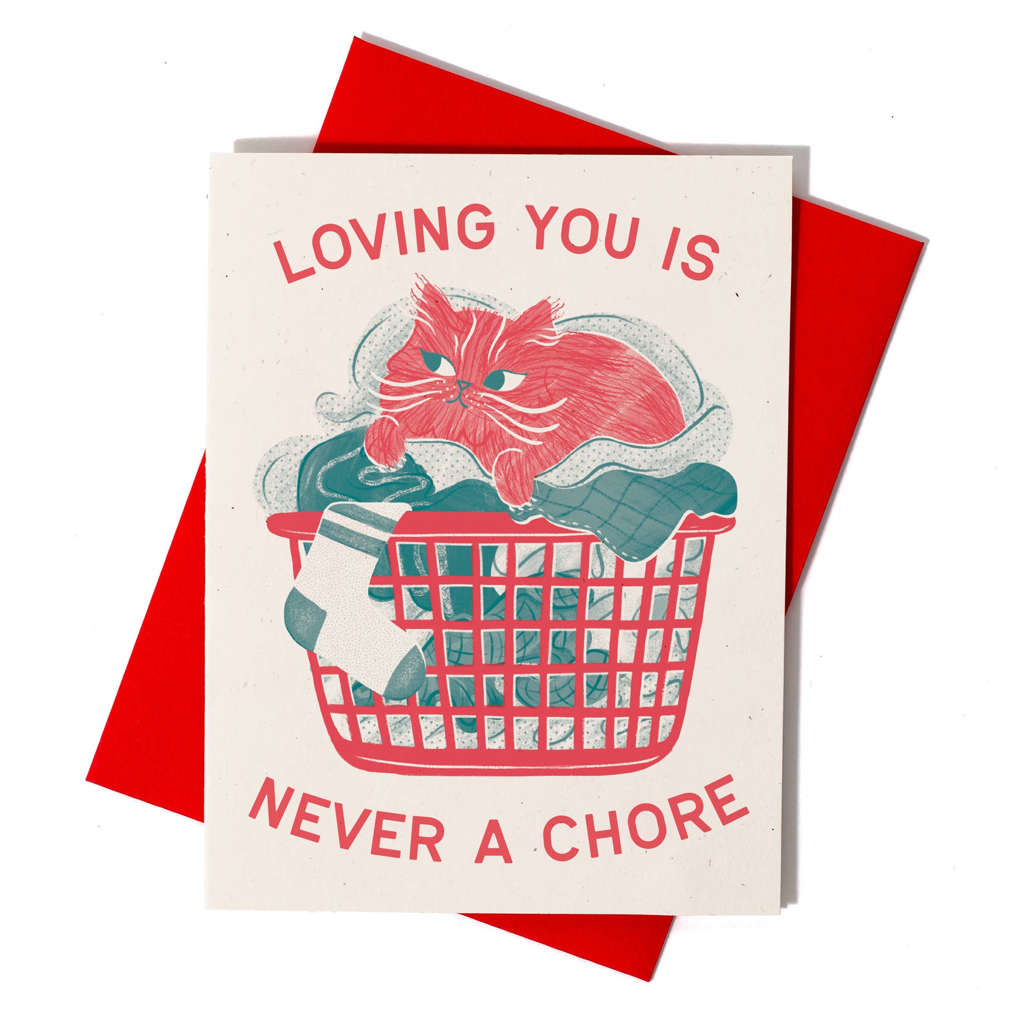 Card with a cat in a laundry basket and text 'Loving you is never a chore' on a red envelope.
