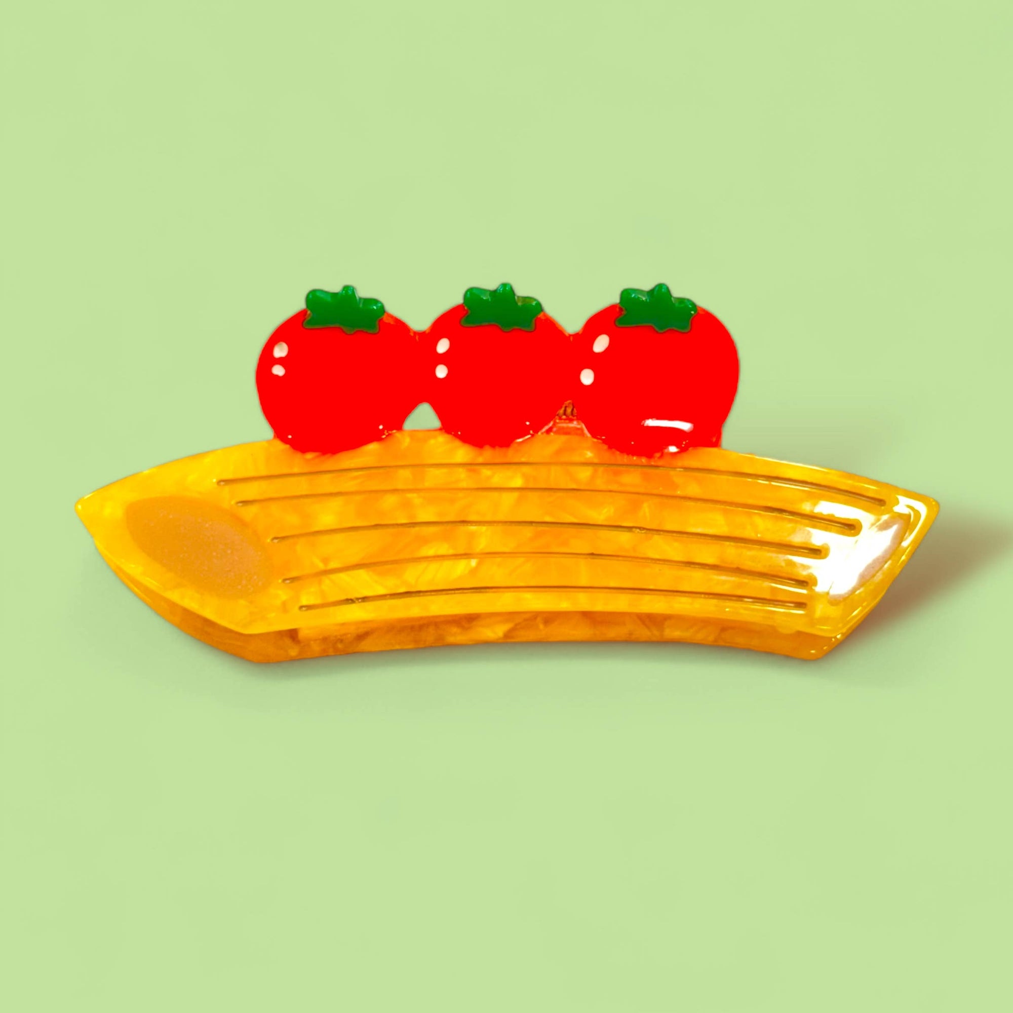 Yellow noodle with red tomatoes on a light green background