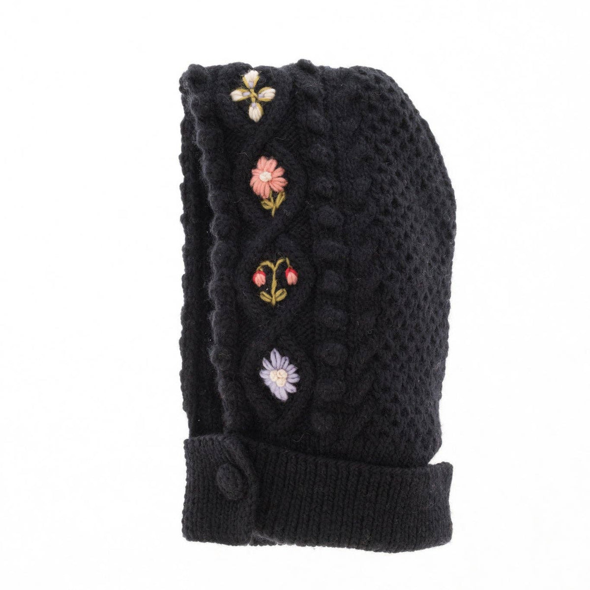 Black knitted glove with floral embroidery on a white background