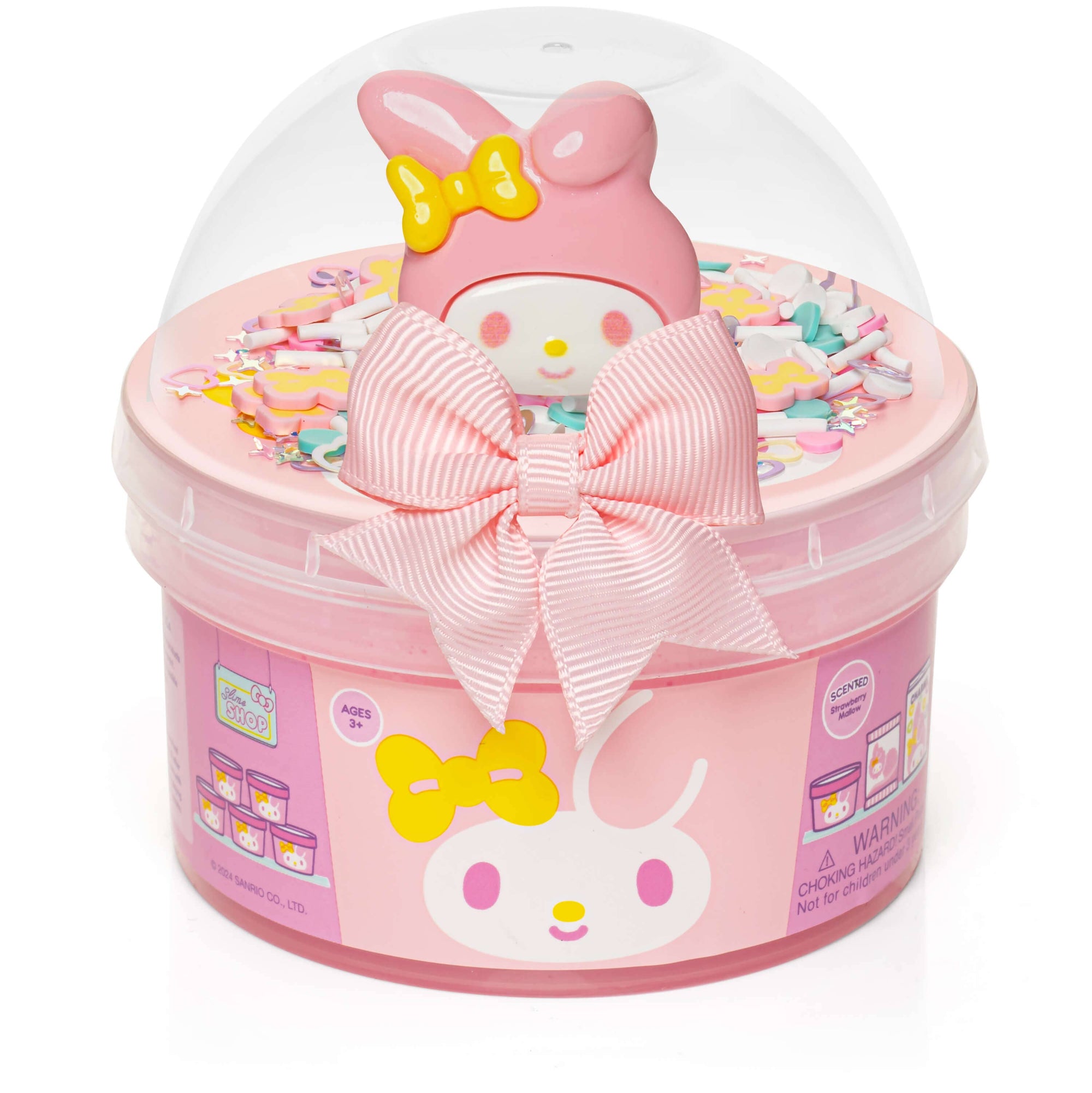 Pink toy with a bow in a clear dome with slime on a white background