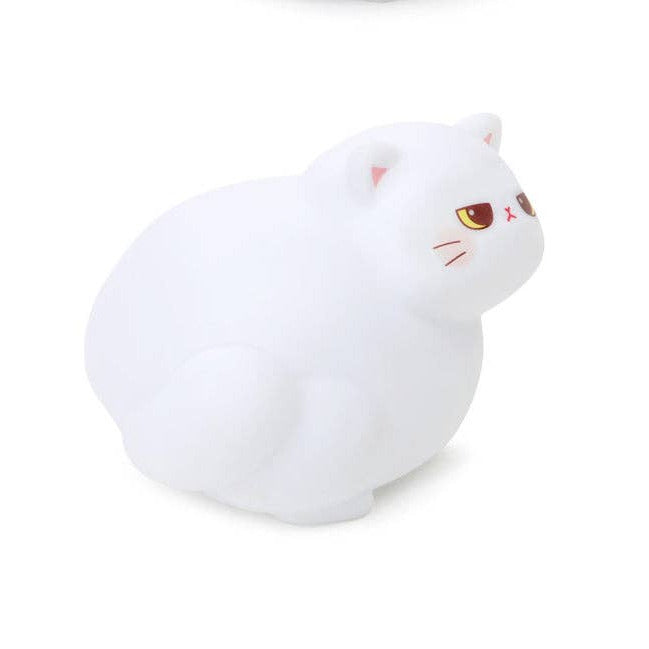 White cat-shaped squishy toy on a white background