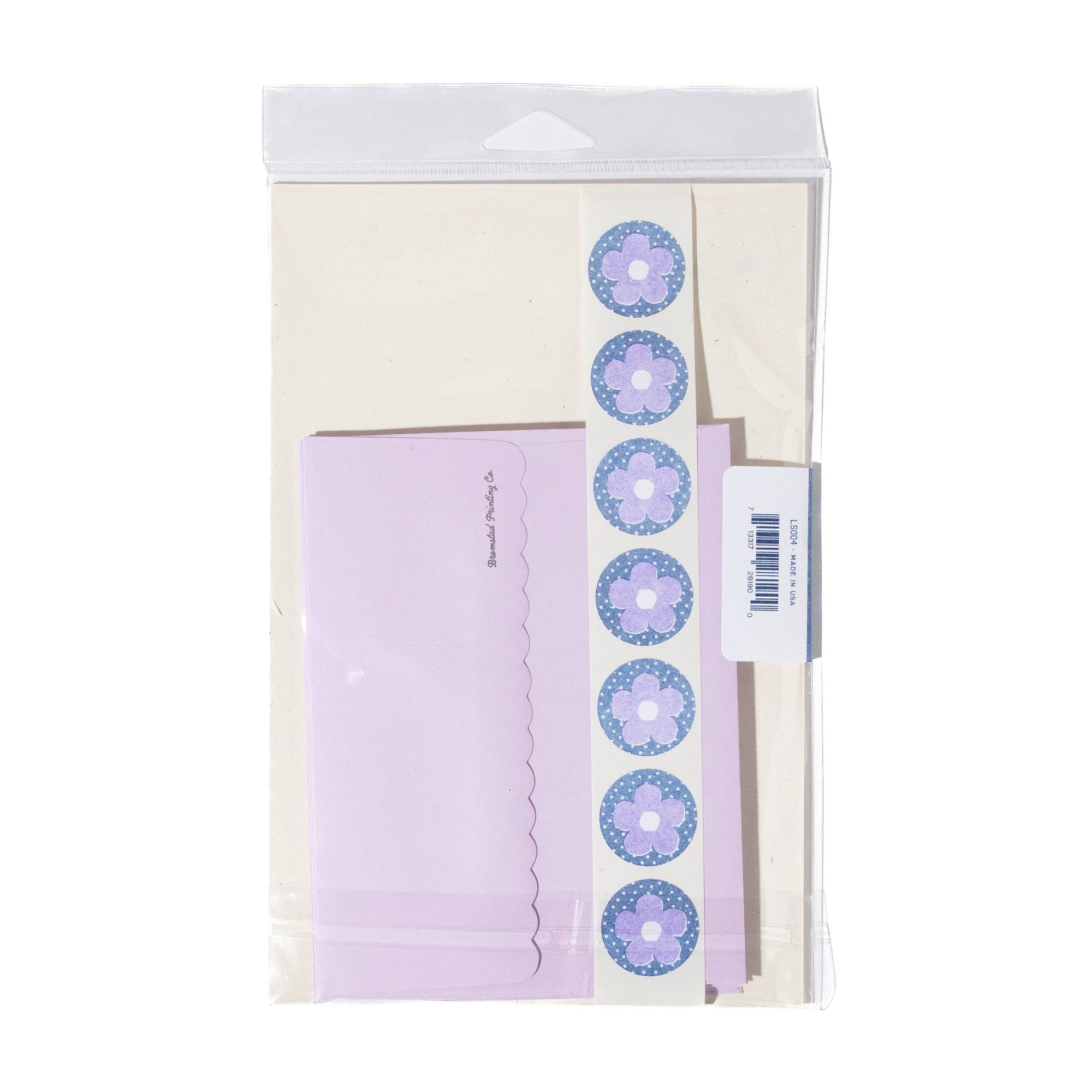 Packaged product with decorative stickers on a white background