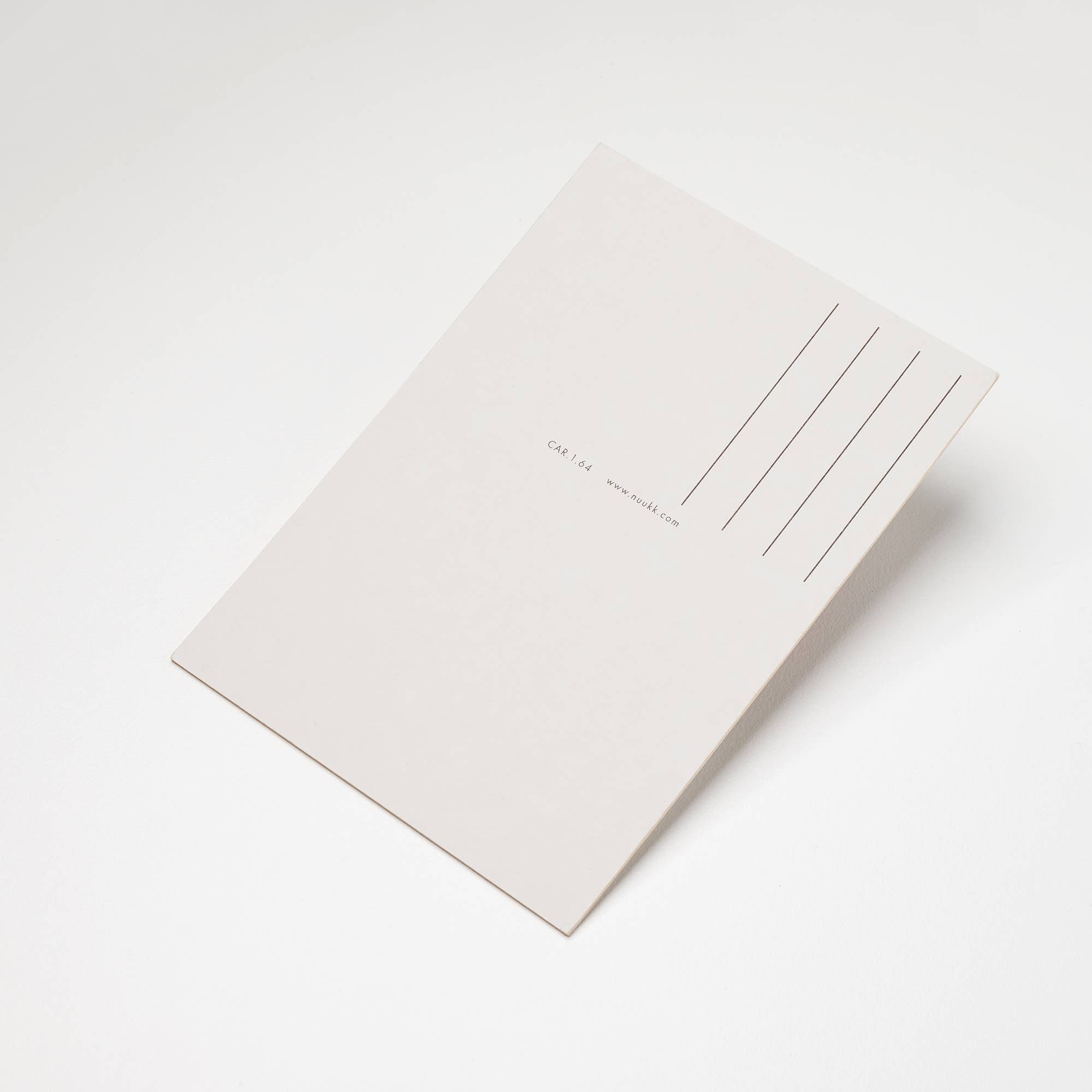 White envelope with text on a white background