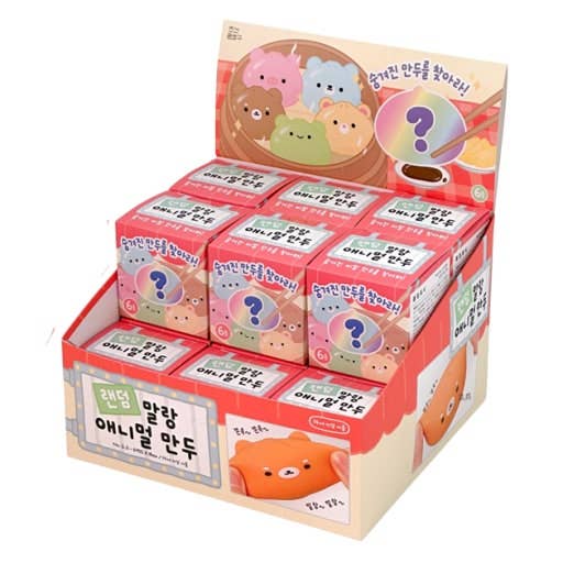 Display of small boxes with cartoon animal designs and question marks on a white background