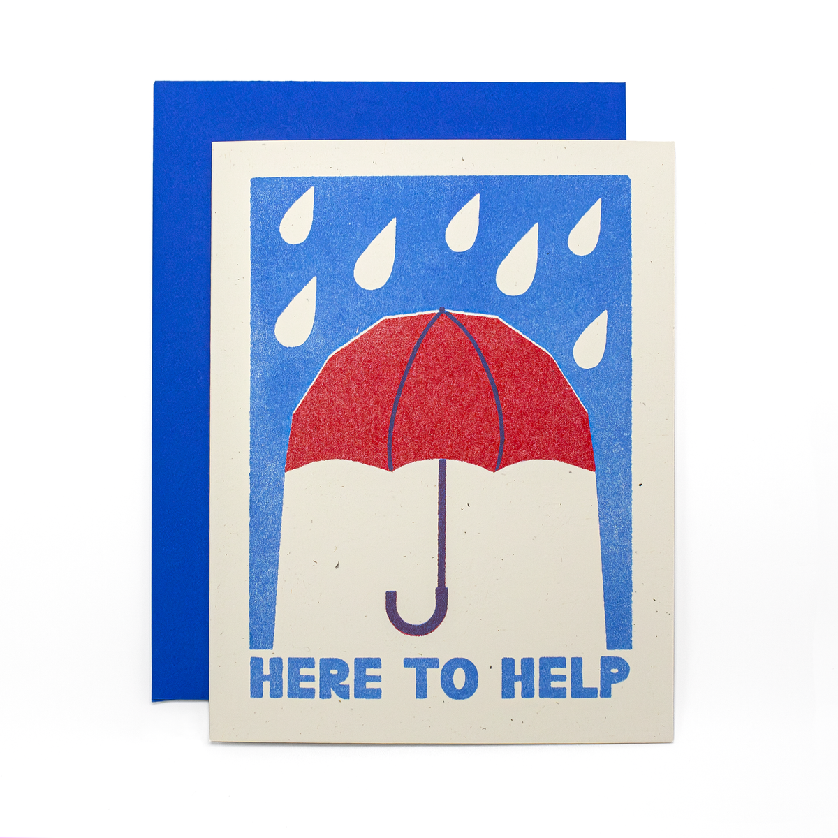 A square greeting card with a blue envelope behind it, featuring a minimalist illustration of a red umbrella under falling raindrops on a cream background, with the text 'HERE TO HELP' in blue at the bottom.