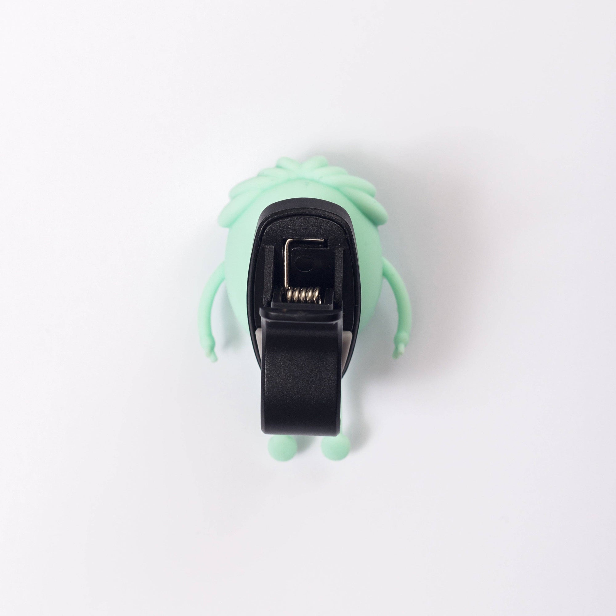 Green and black device on a white background