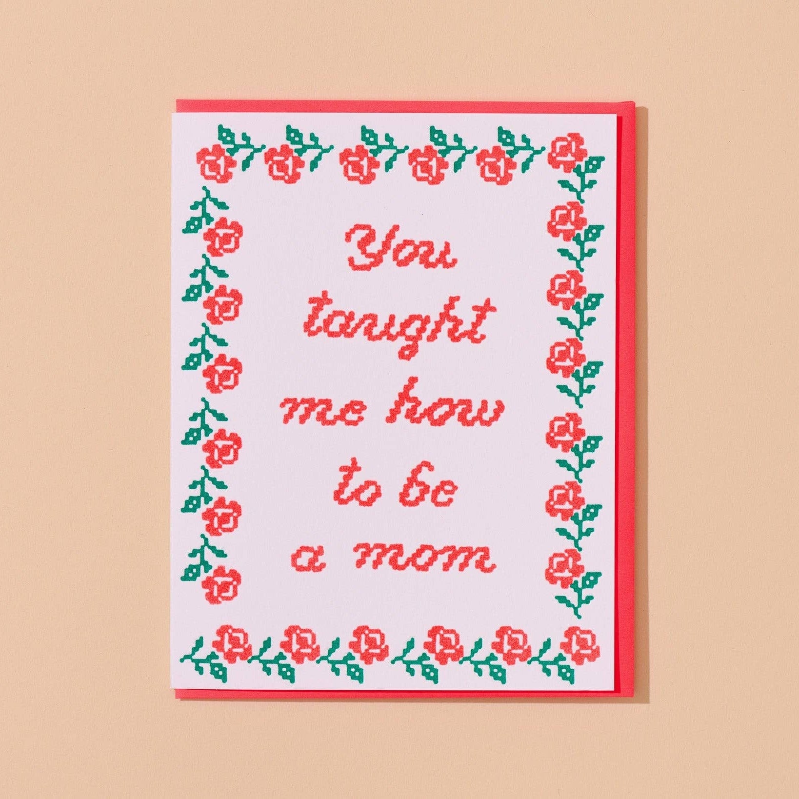 Greeting card with floral border and text on a beige background