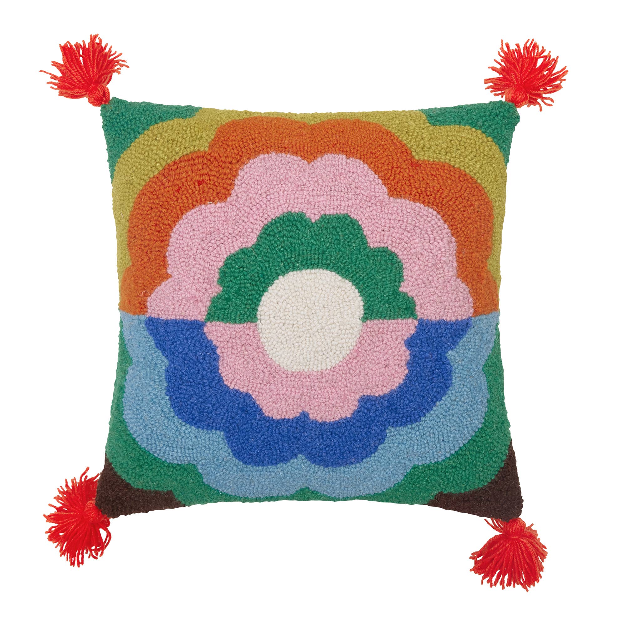 Colorful floral-patterned pillow with red tassels on a white background