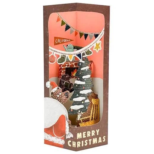 Decorative Christmas gift box with festive illustrations and 'Merry Christmas' text.