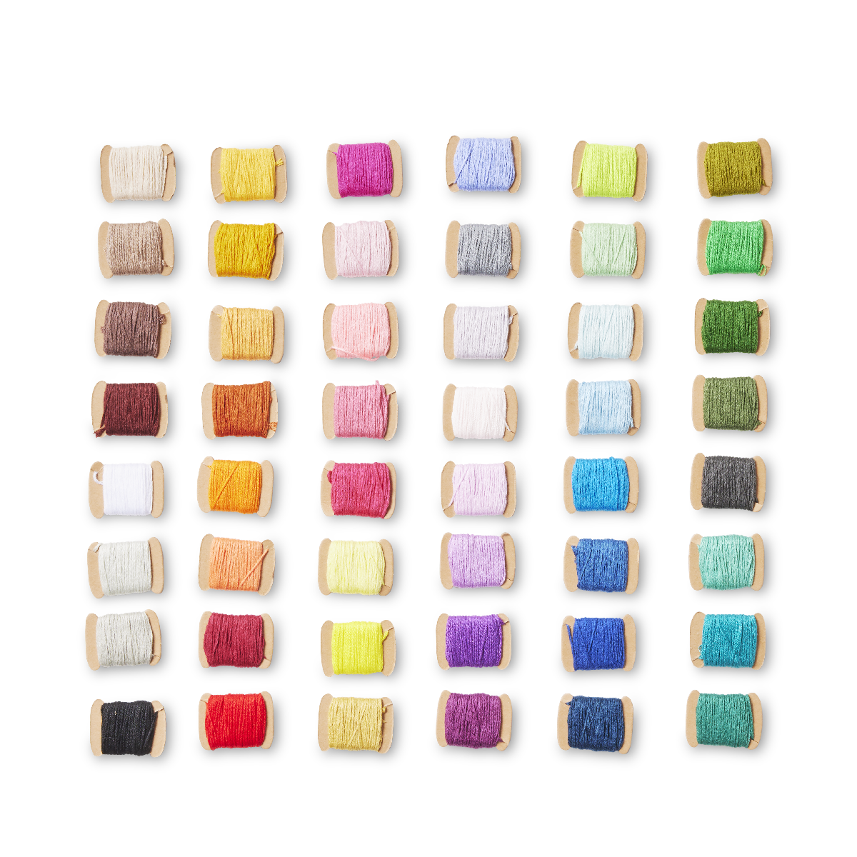 A grid of 36 small thread spools in assorted colors arranged in six rows and six columns on a plain white background.