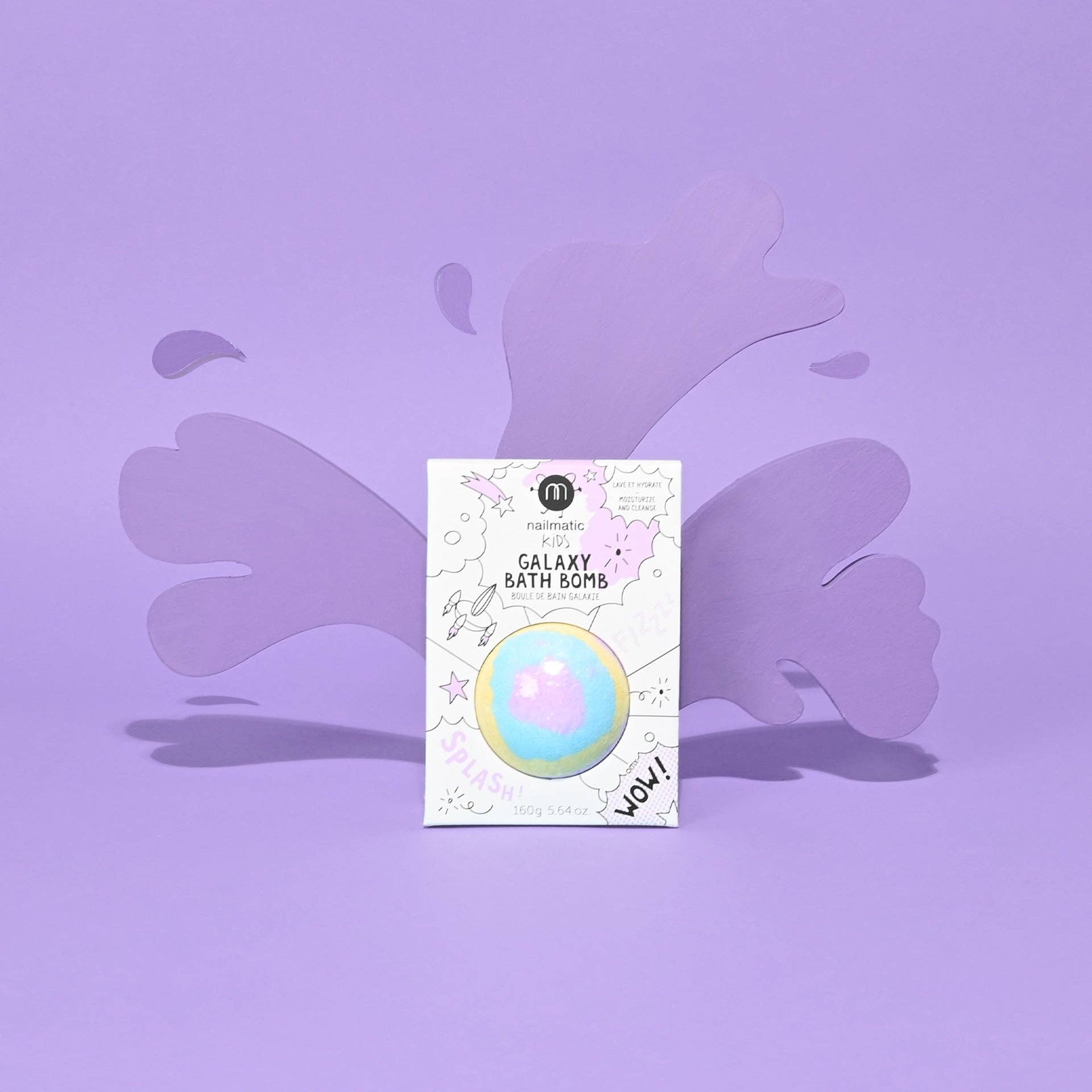 Galaxy bath bomb packaging on a purple background
