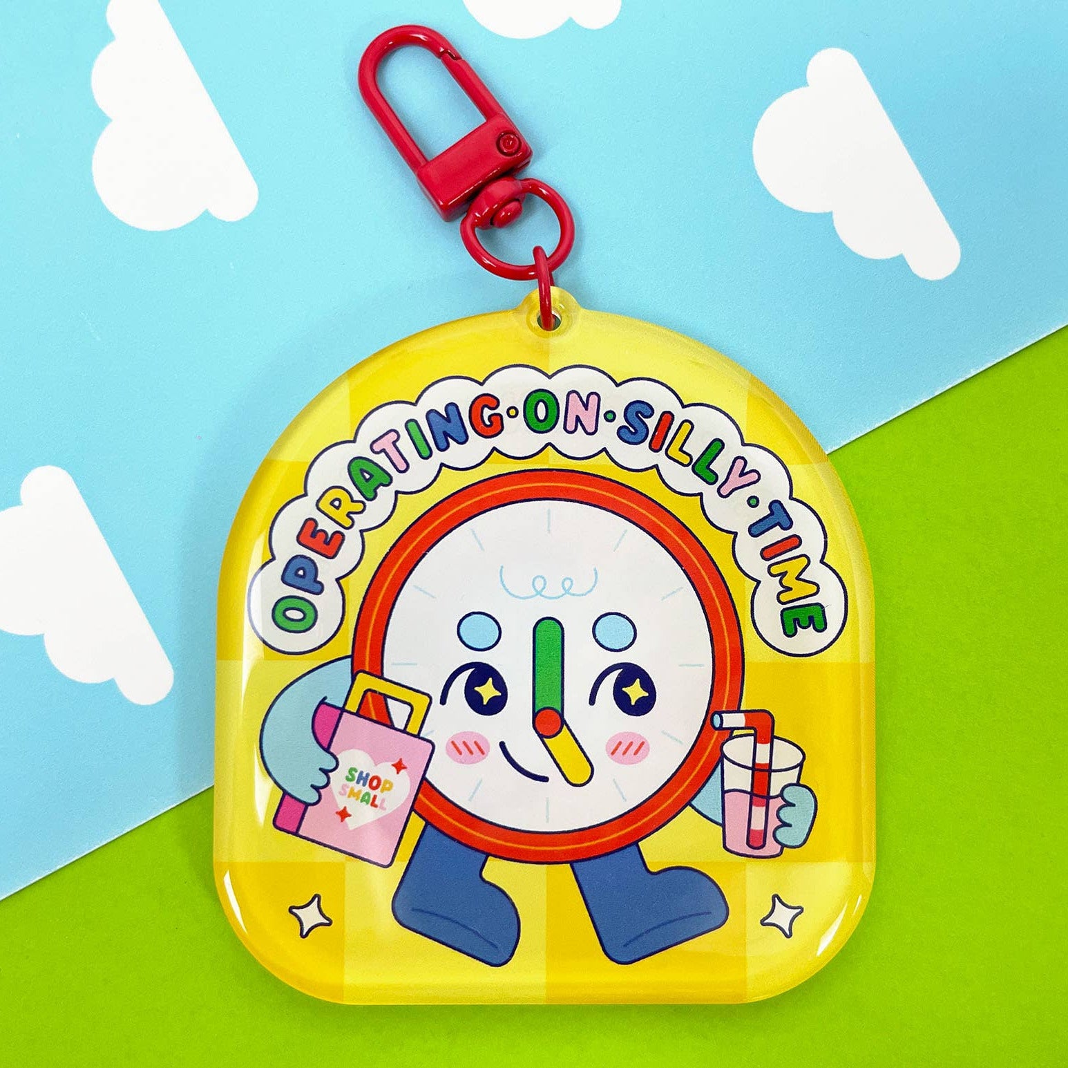 Colorful children's toy with a cartoon character on a blue and green background