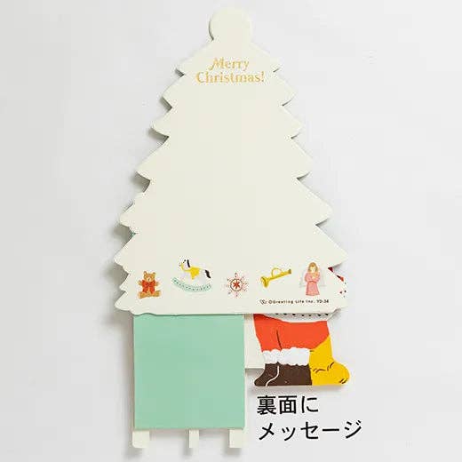 Christmas tree-shaped sticky note pad with cartoon characters on a white background