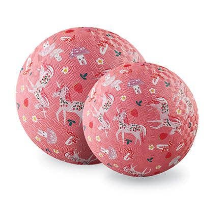 Two pink exercise balls with unicorn pattern on a white background