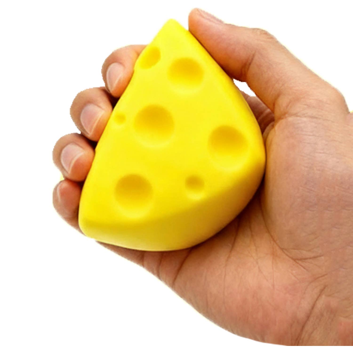 Hand holding a yellow cheese-shaped stress reliever toy against a white background
