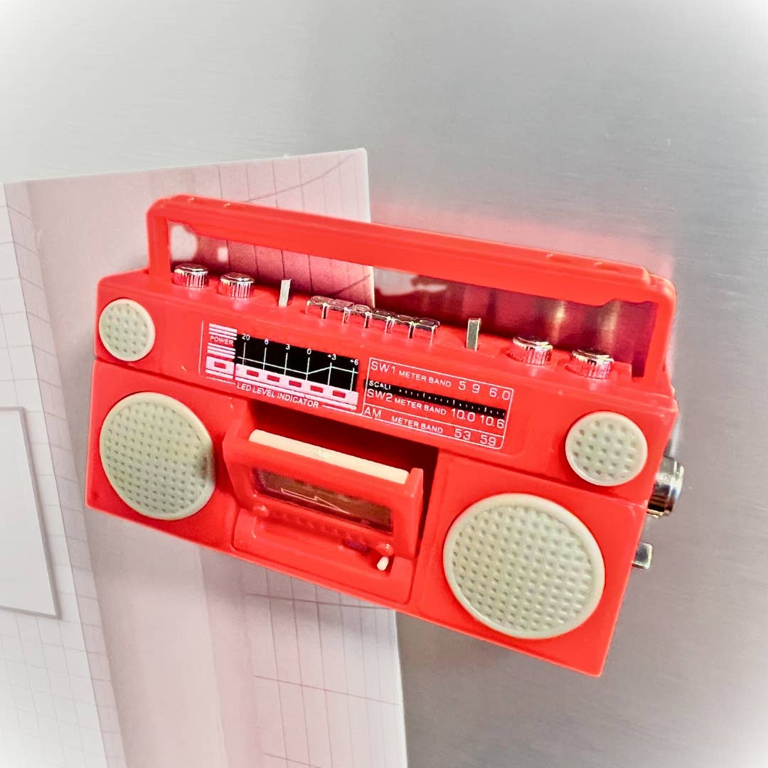 Red retro-style radio on a white background