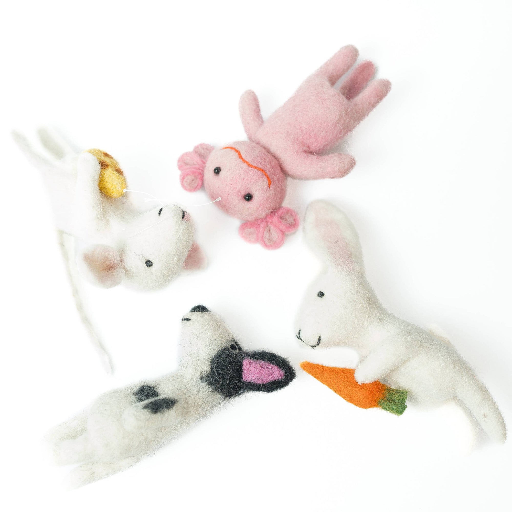 Set of small plush toys including a dog, rabbit, and cat on a white background