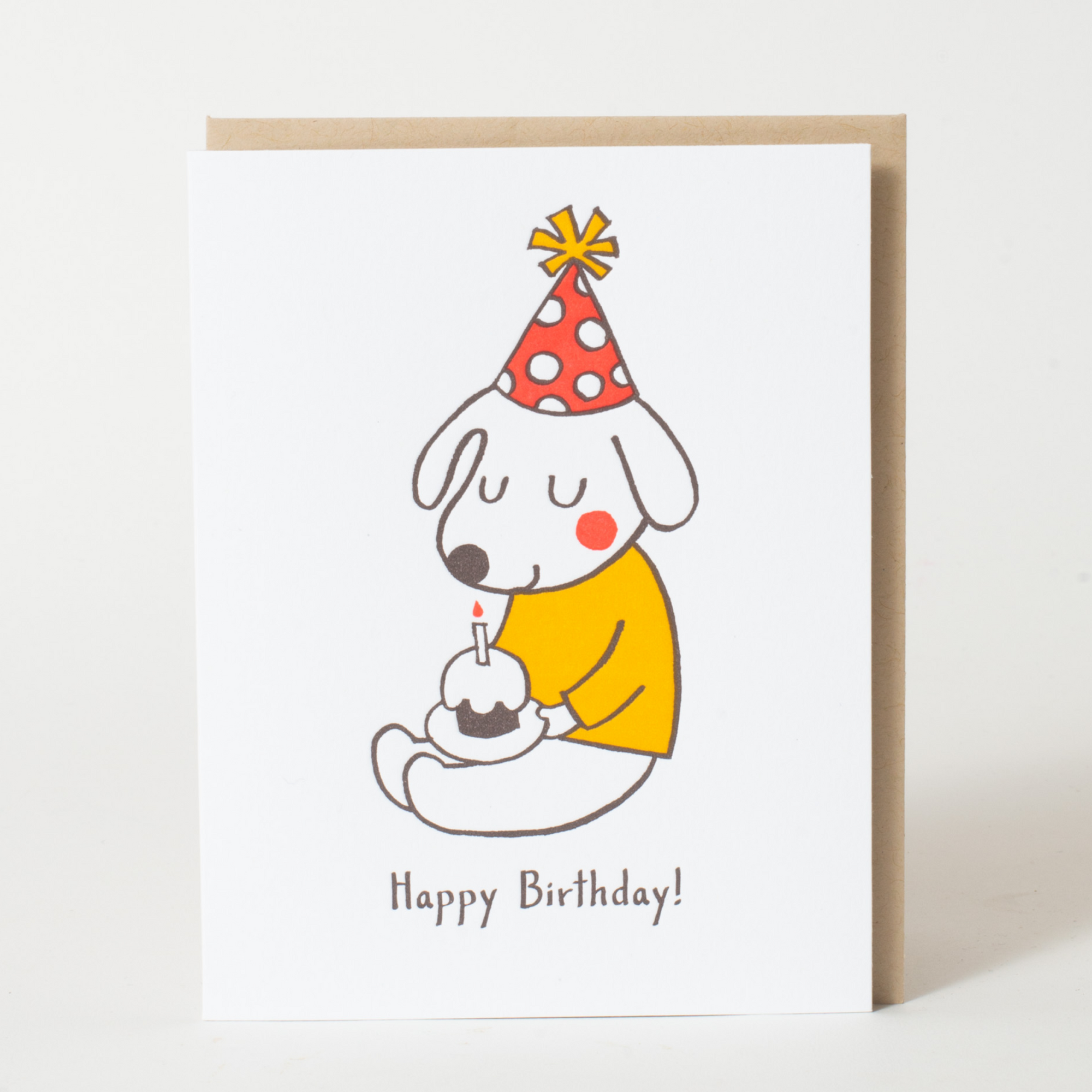 Cartoon dog in a party hat with a birthday cake and candle on a white background, labeled 'Happy Birthday!'.