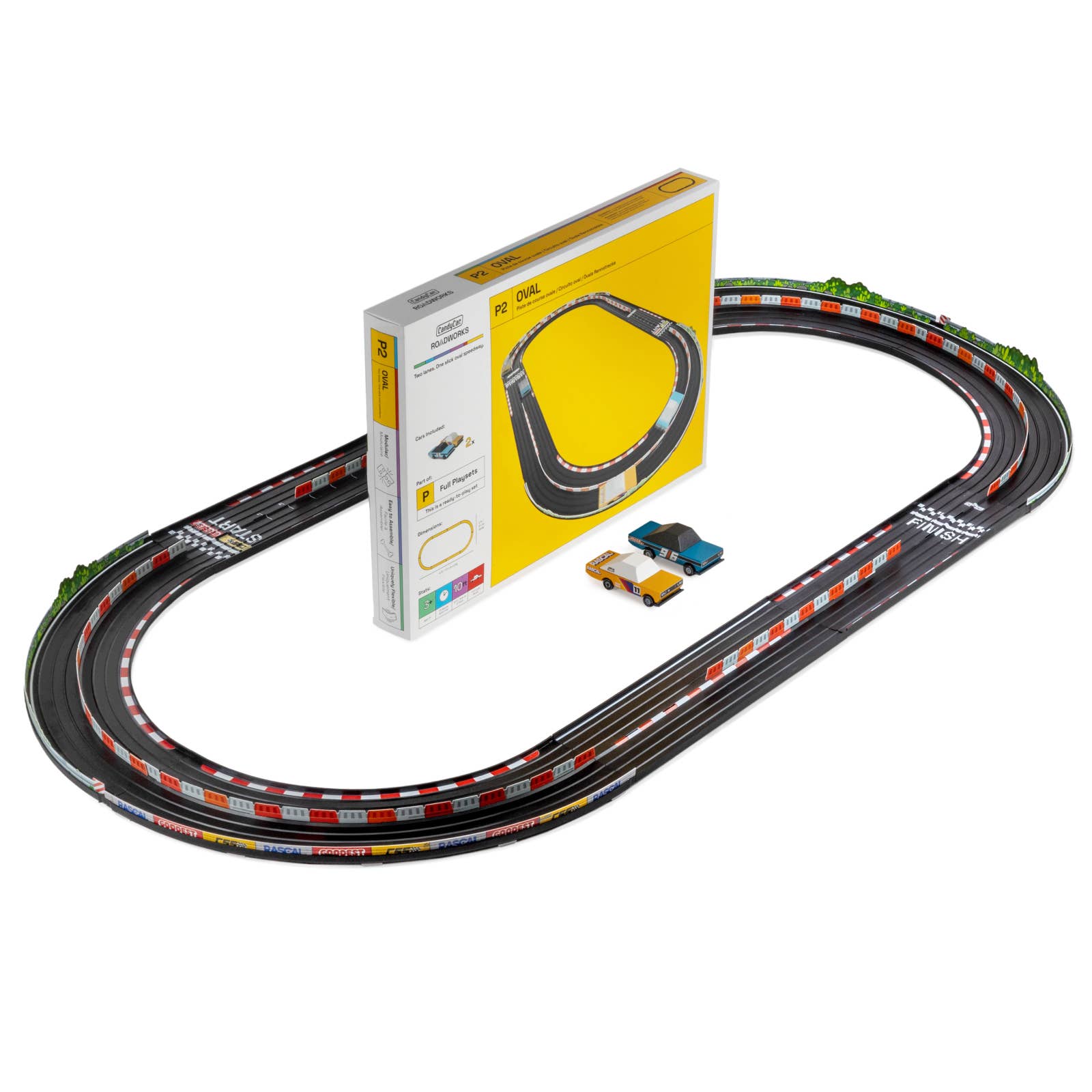 Toy race track set with a yellow packaging box on a white background