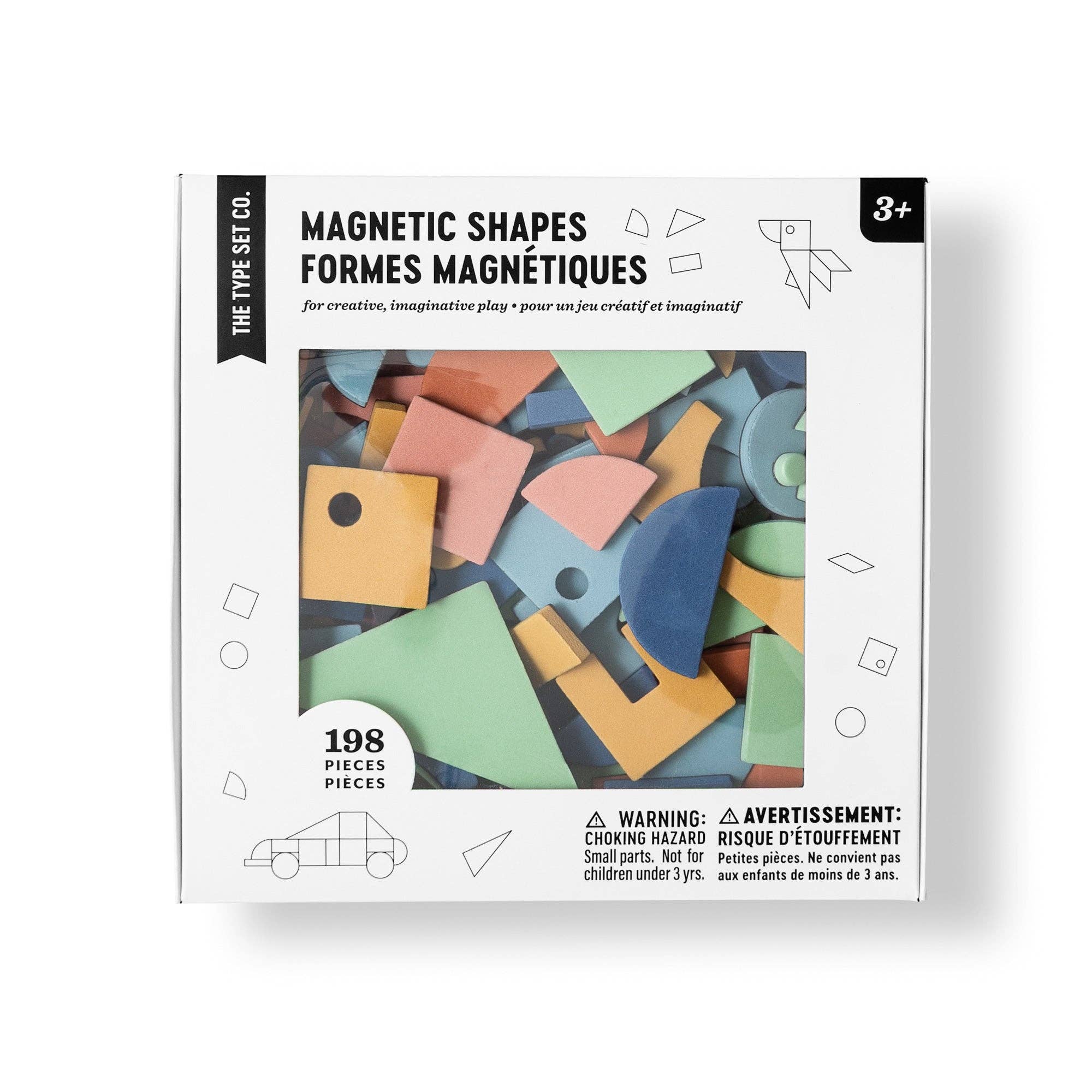 Box of magnetic shapes with colorful geometric pieces on a white background