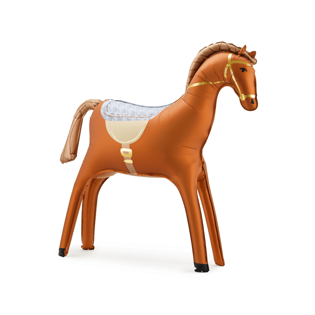 An inflatable toy horse in a warm brown color, featuring a saddle with a light blue and beige pattern, and gold-colored bridle details, shown on a plain white background.