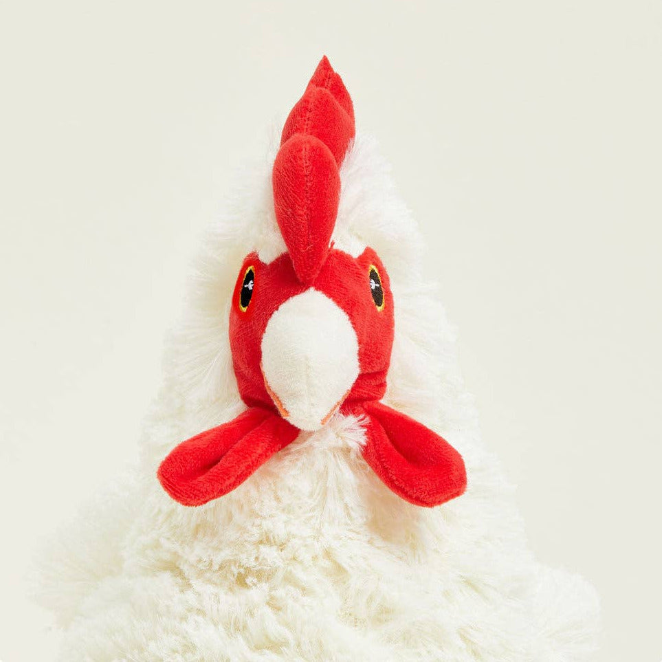 Red plush toy resembling a lobster on a white background