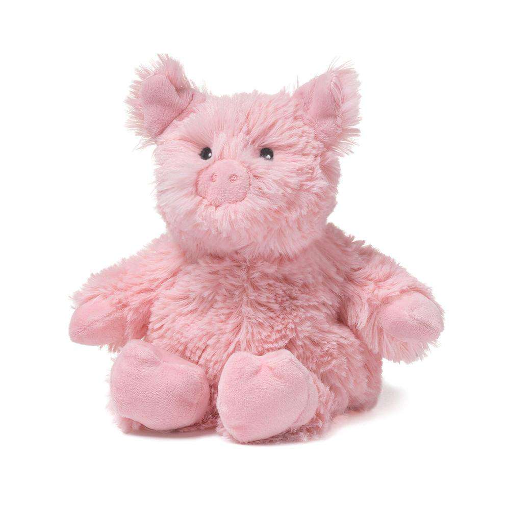 Pink plush pig toy on a white background