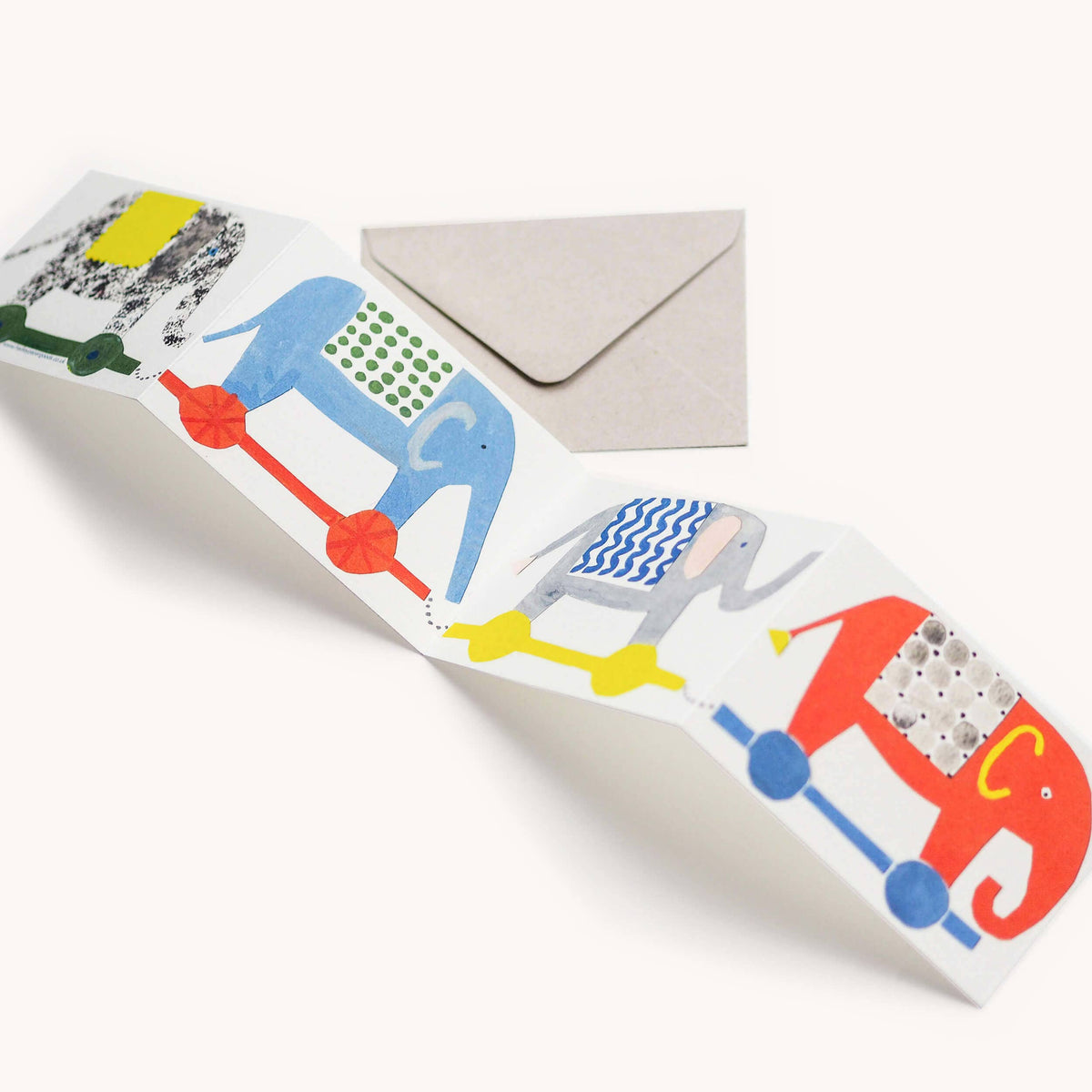 Colorful greeting card with beach-themed illustrations on a white background