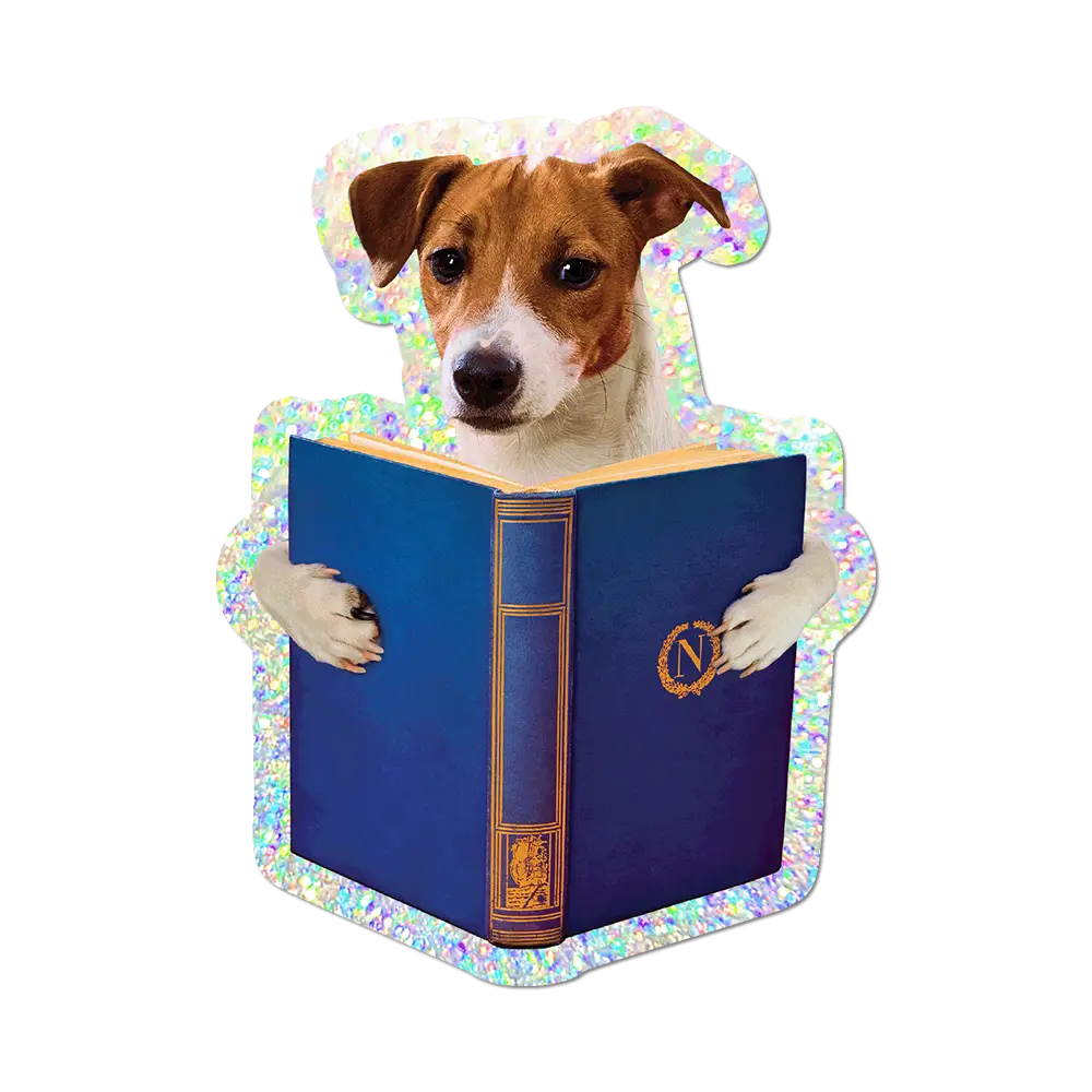 A dog sticker or decal featuring a brown and white dog holding an open blue book, with a holographic iridescent border, shown on a plain white background.