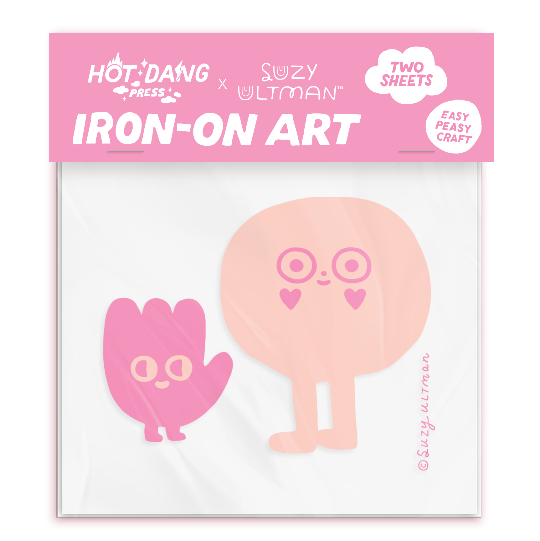 Iron-on art package with two cute character designs on a pink background