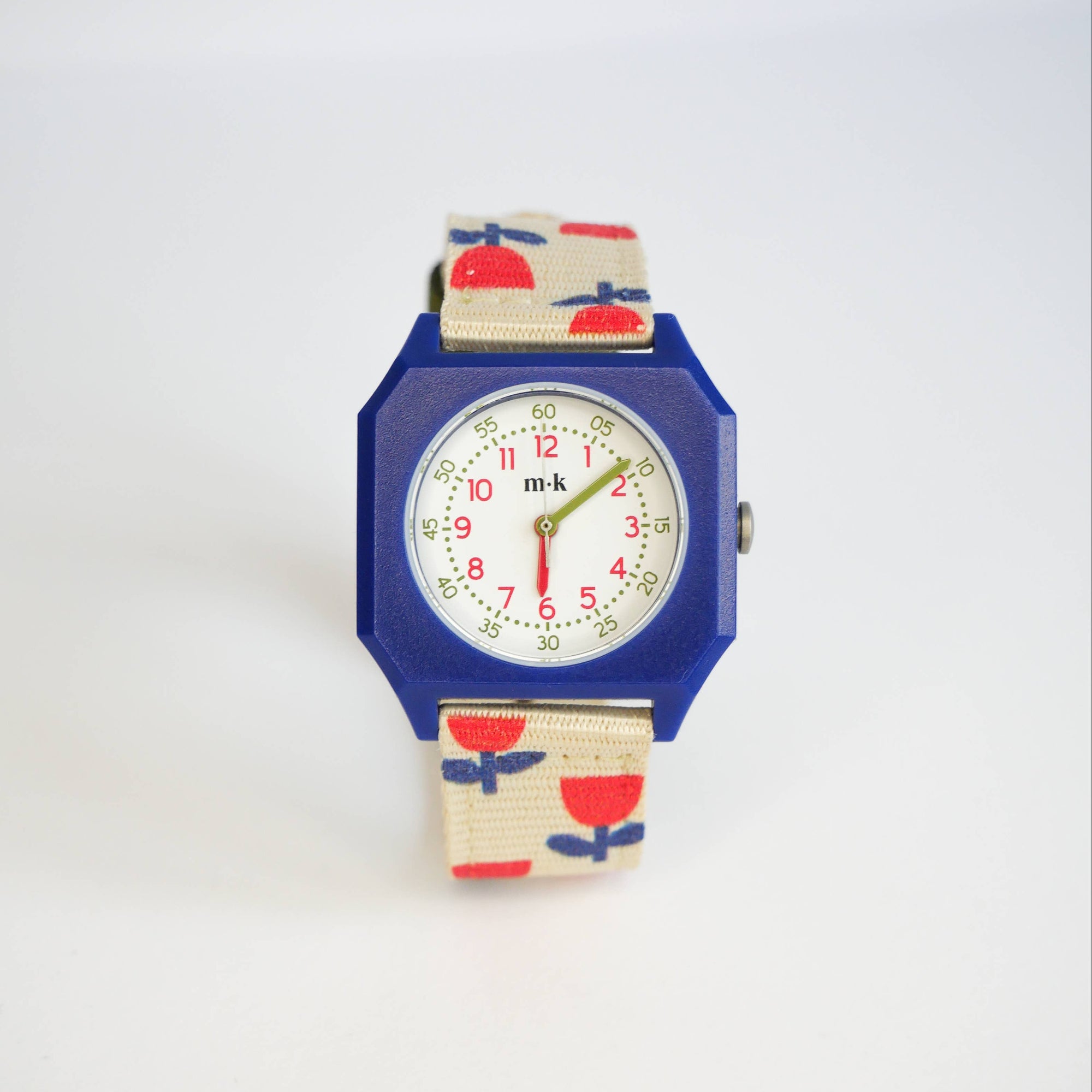 Wristwatch with colorful strap on a white background