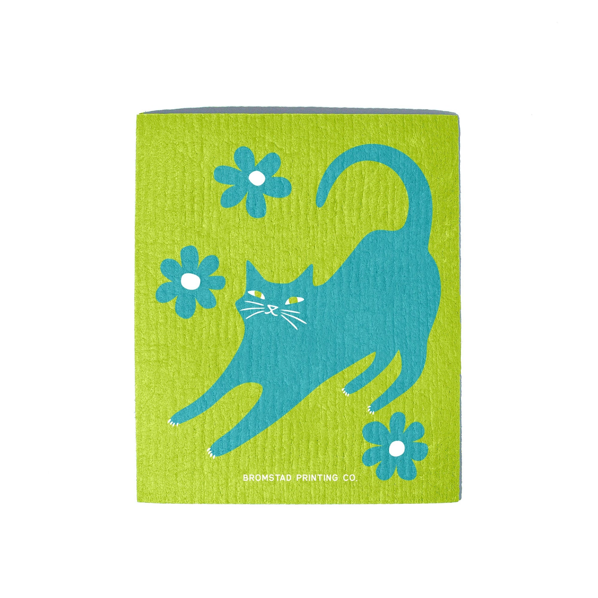 A square green dish towel featuring a blue stretching cat and three blue flowers, with the brand name 'BROMSTAD PRINTING CO.' printed at the bottom.