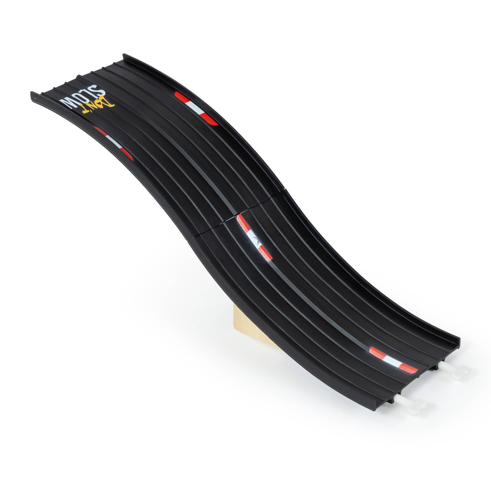 Black toy car track with red accents on a white background